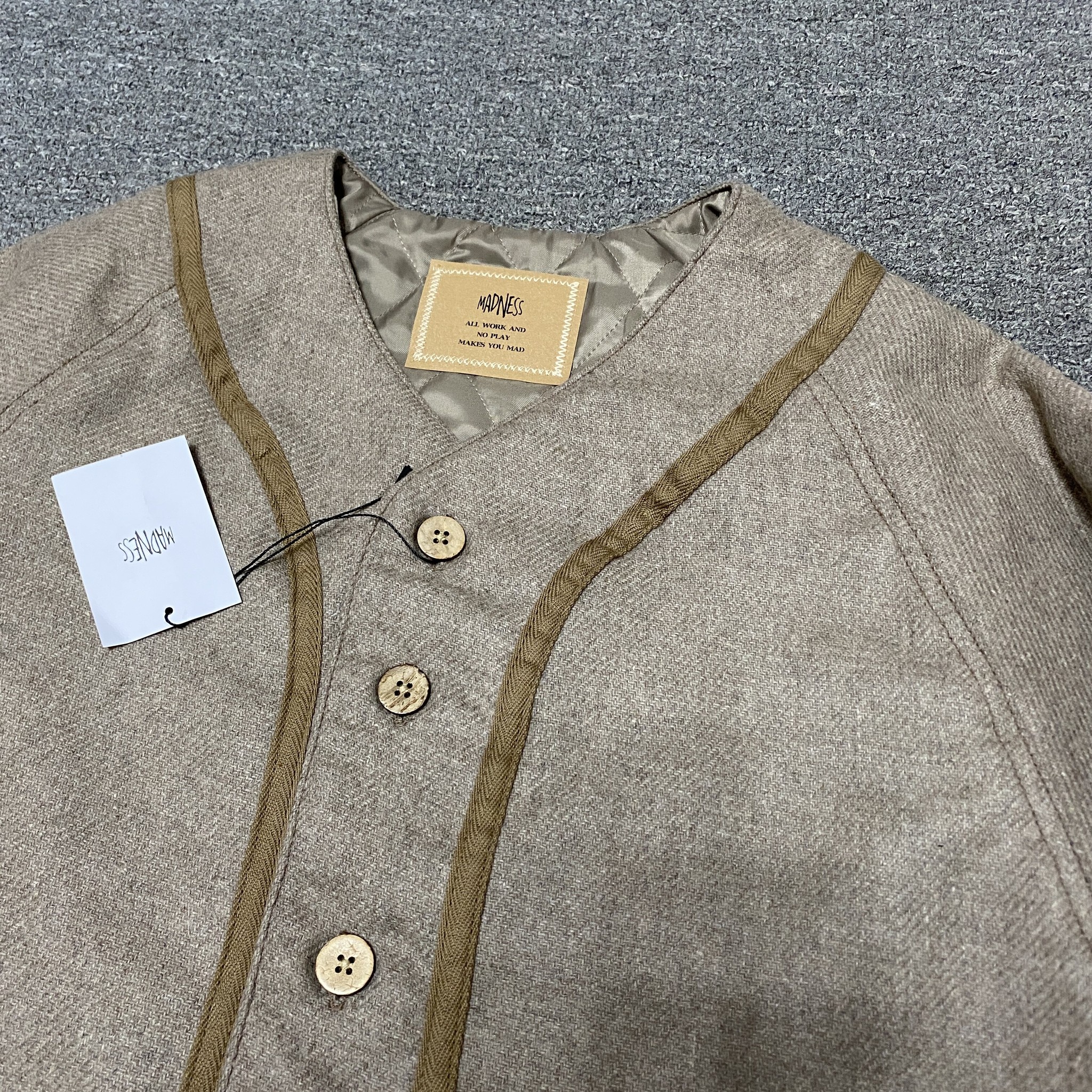MADNESS 23AW Wool Baseball Jacket — detail