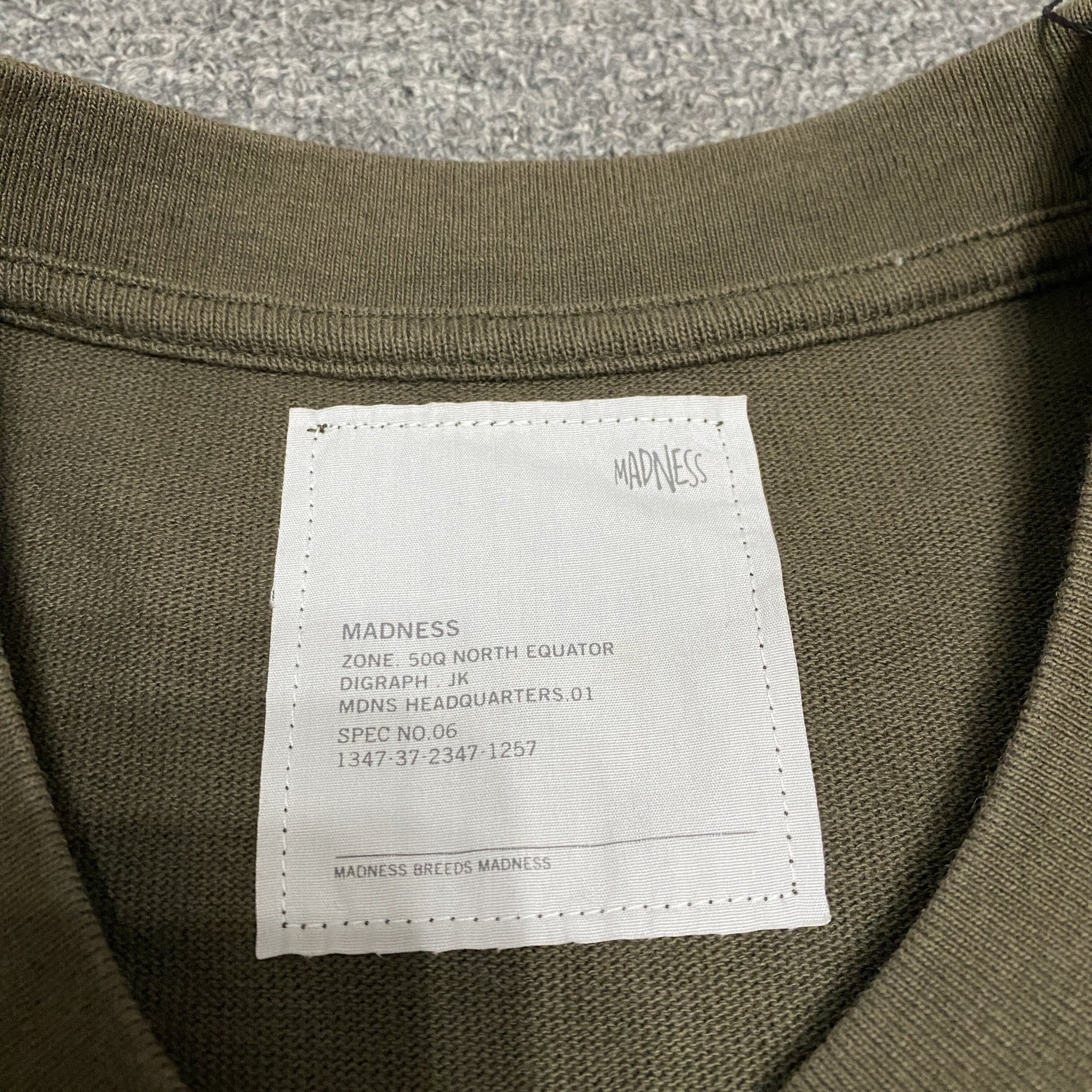 MADNESS 23AW 10th Anniversary Wash Tee — back