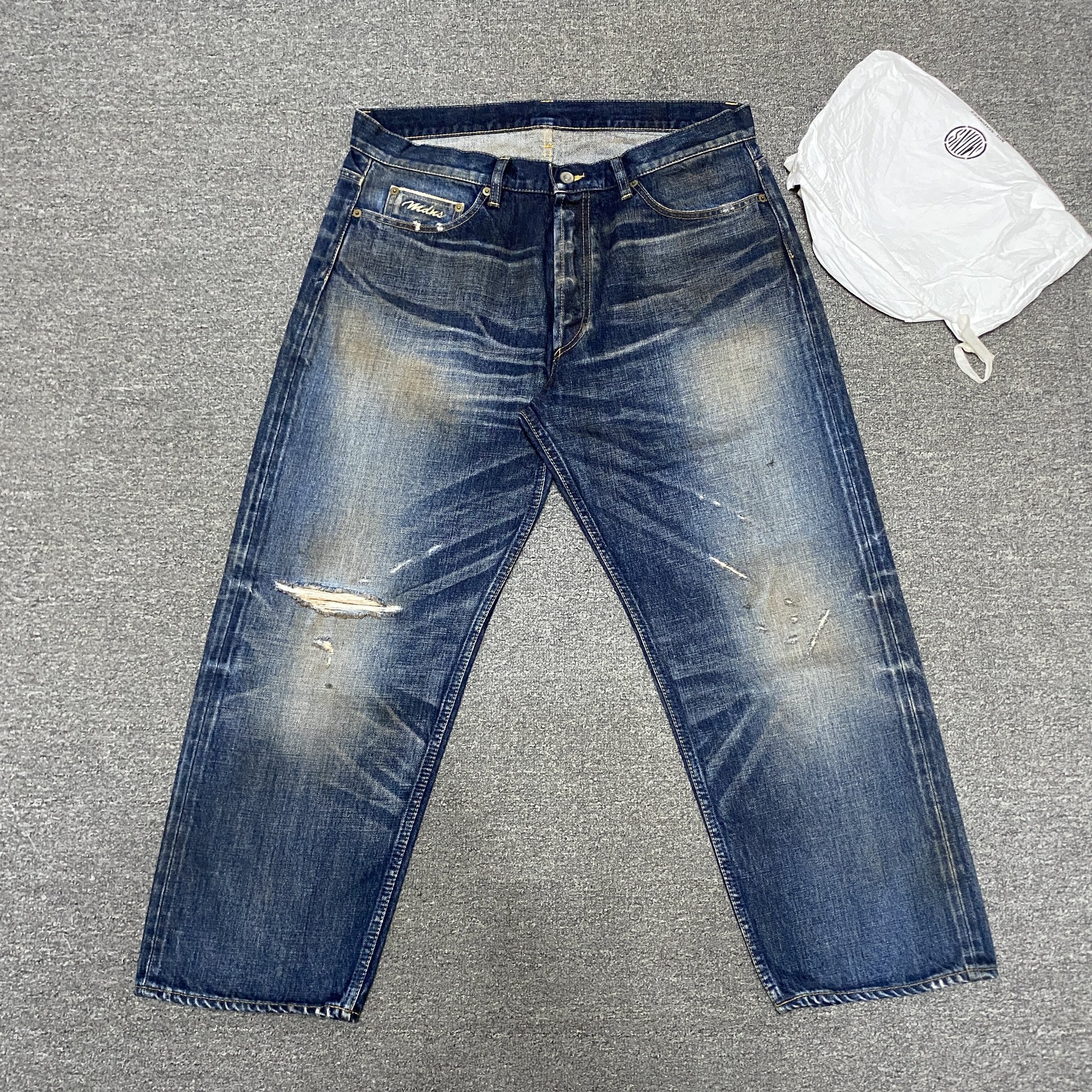 MADNESS 20SS Distressed Jeans