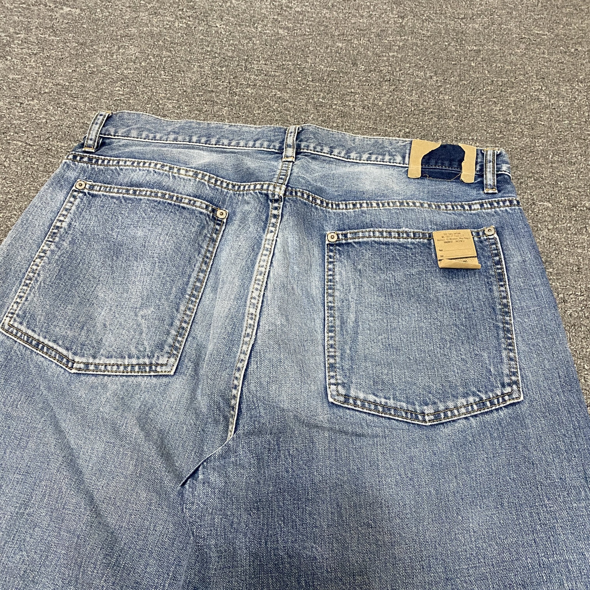 MADNESS 22SS Dual-Cut Blue Jeans — back