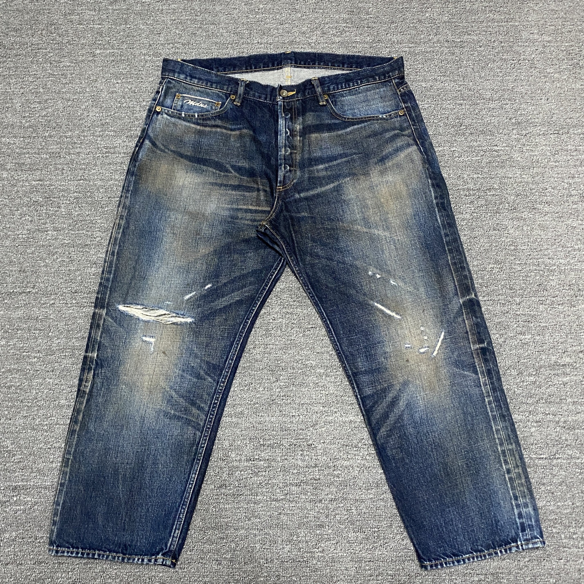 MADNESS 20SS Distressed Denim Jeans