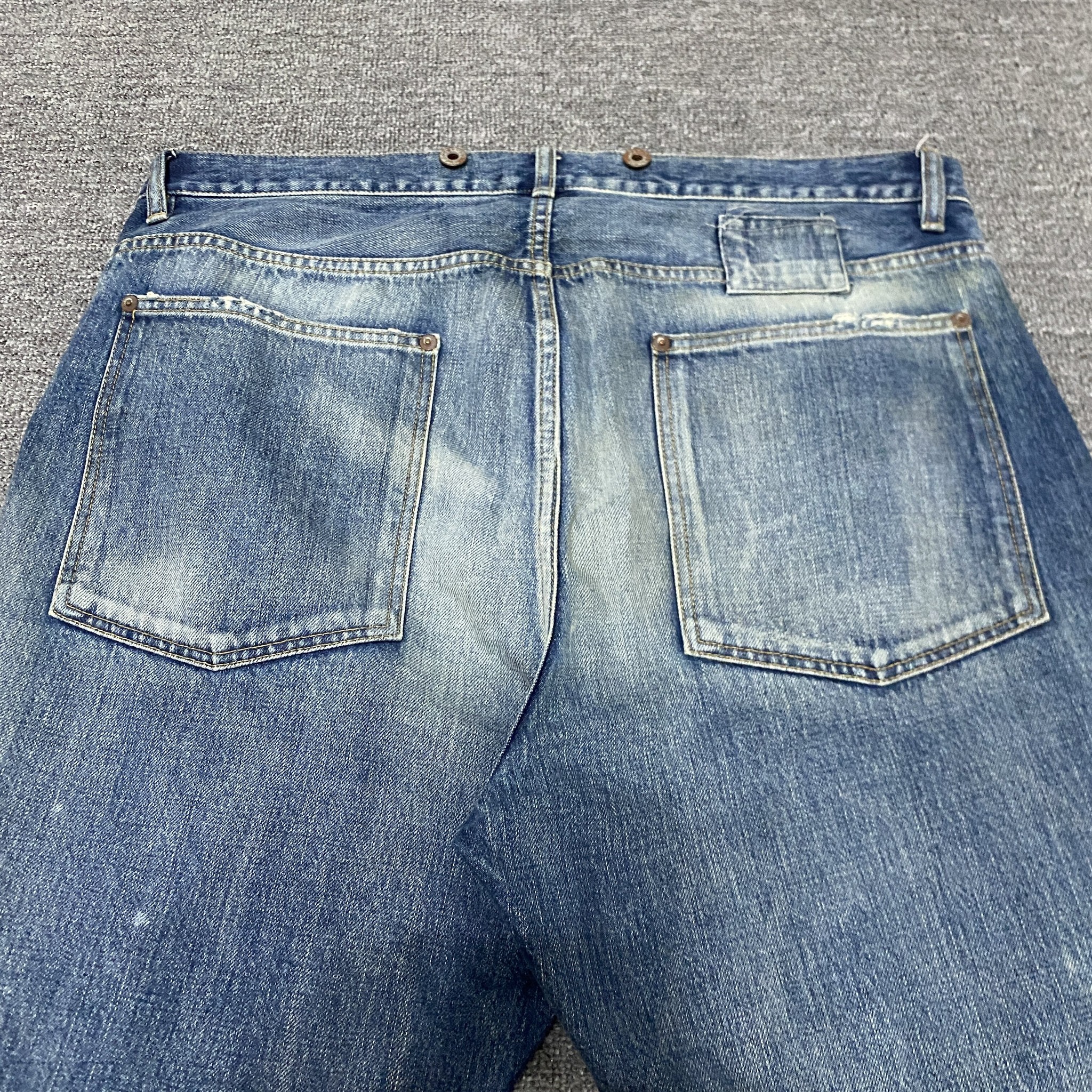 MADNESS 23AW Acid Wash Denim Jeans — detail