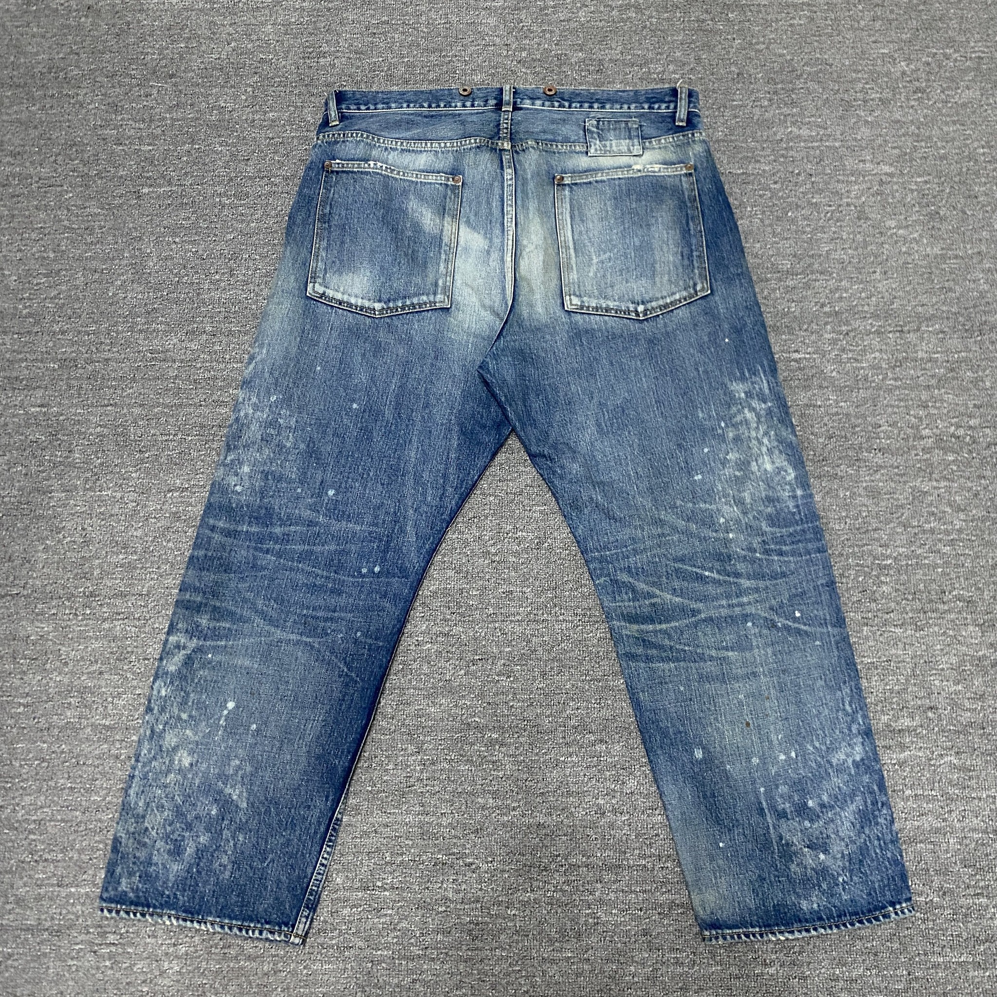 MADNESS 23AW Acid Wash Denim Jeans — front