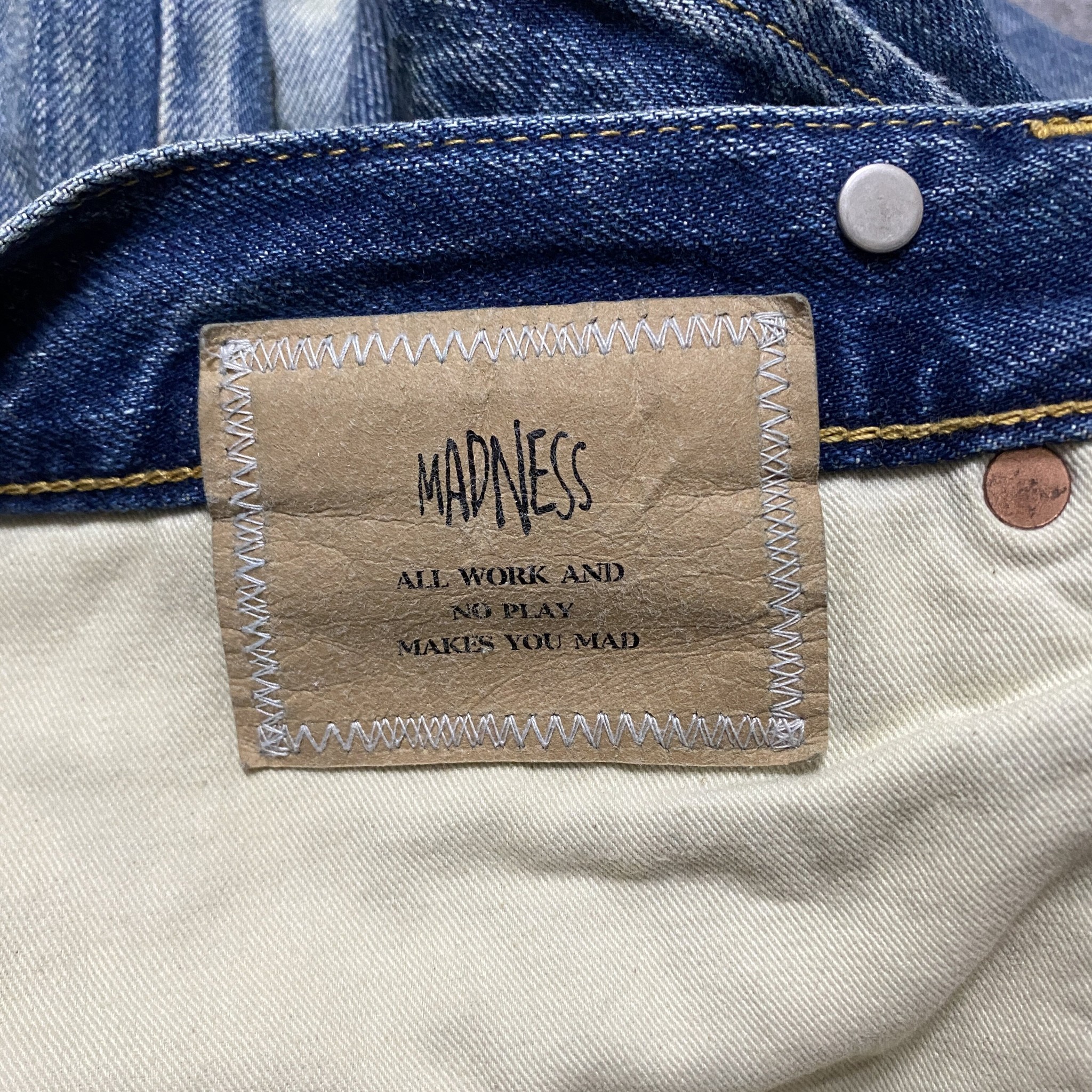MADNESS 23AW Acid Wash Denim Jeans — back