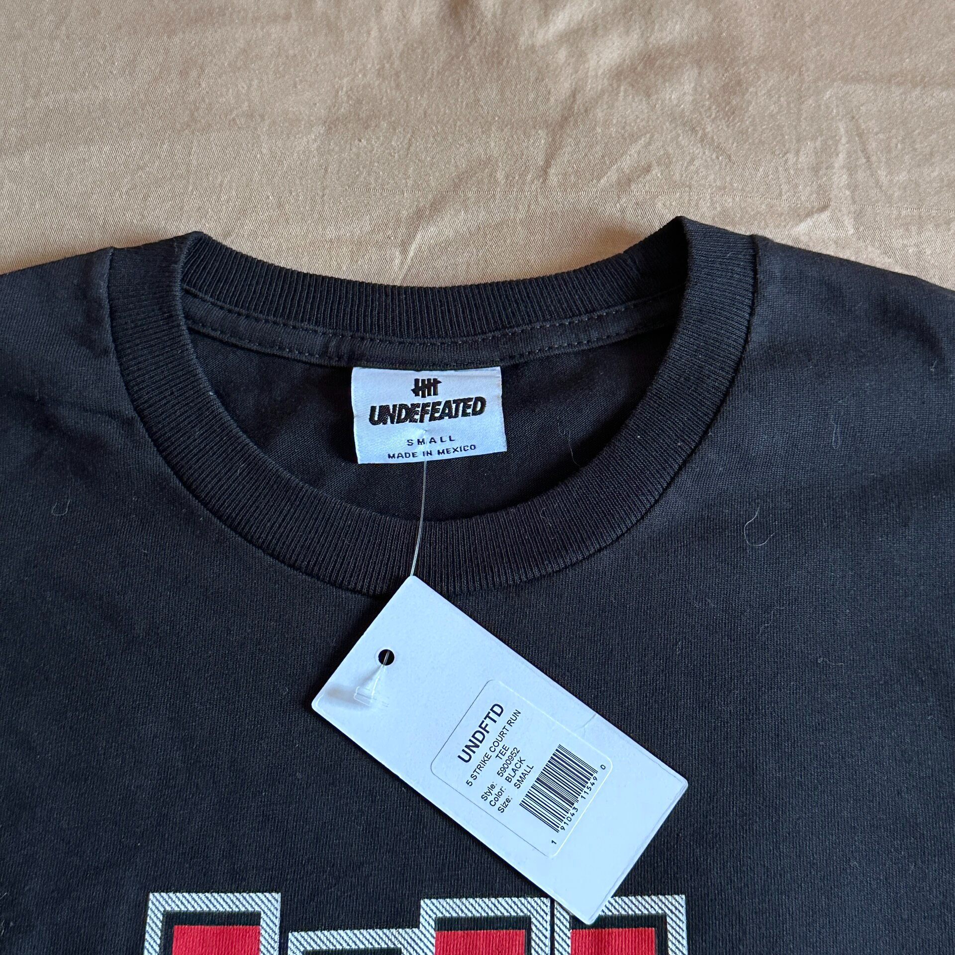 Undefeated Black Red Blue Five-Stripe Tee — detail