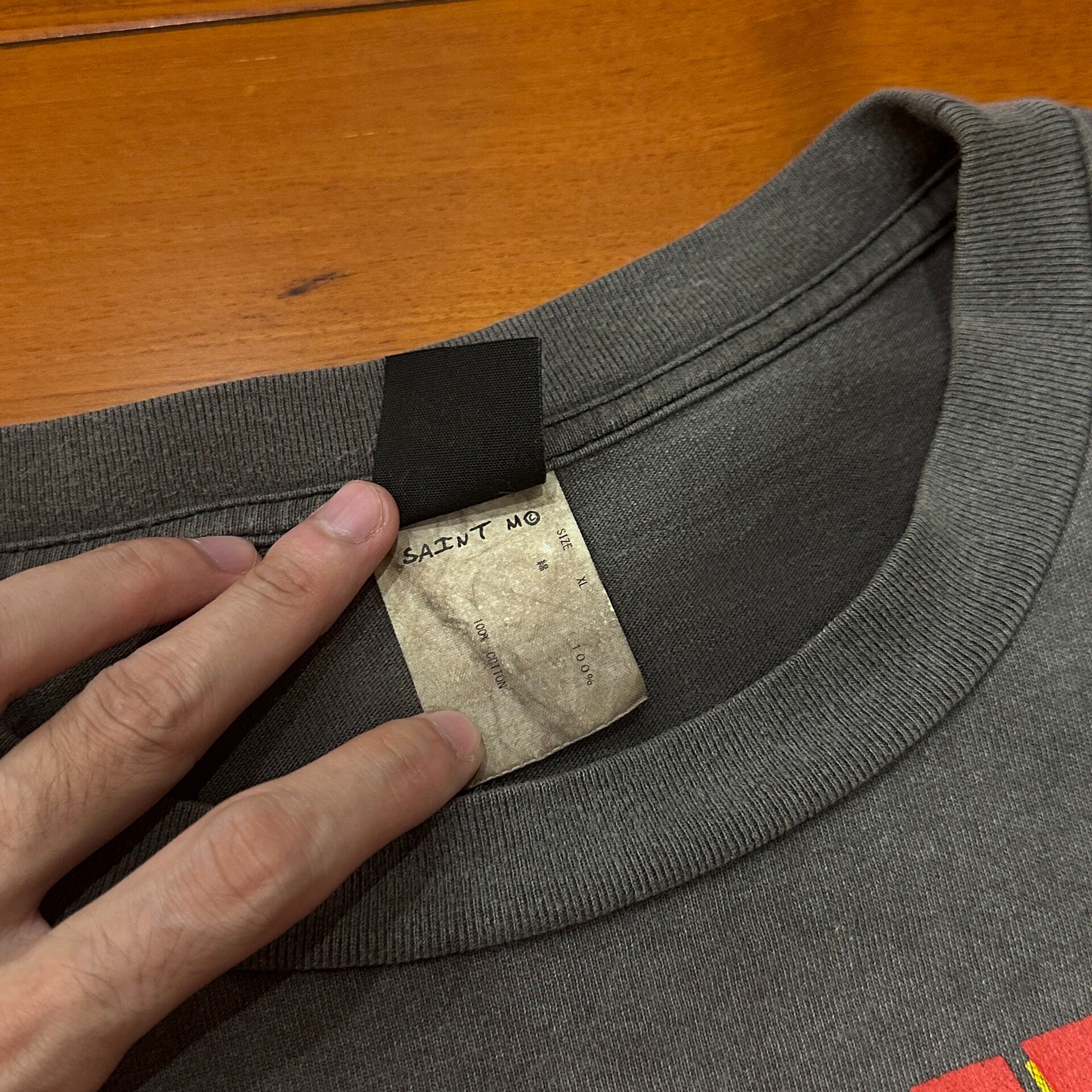 Saint Michael Faded Black Lego Tee — label
