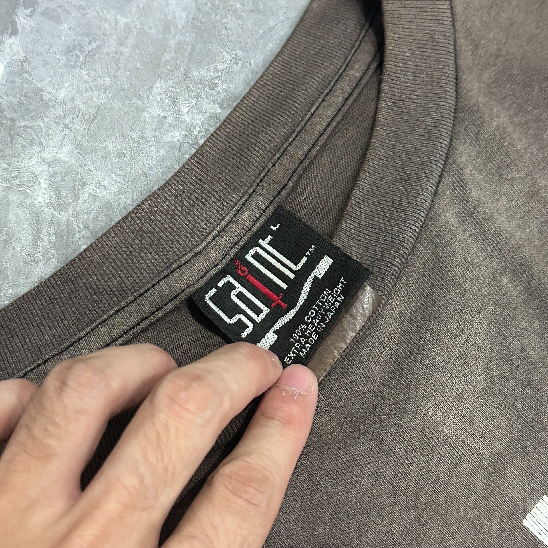 Saint Michael Eye Graphic Long Sleeve Shirt — label