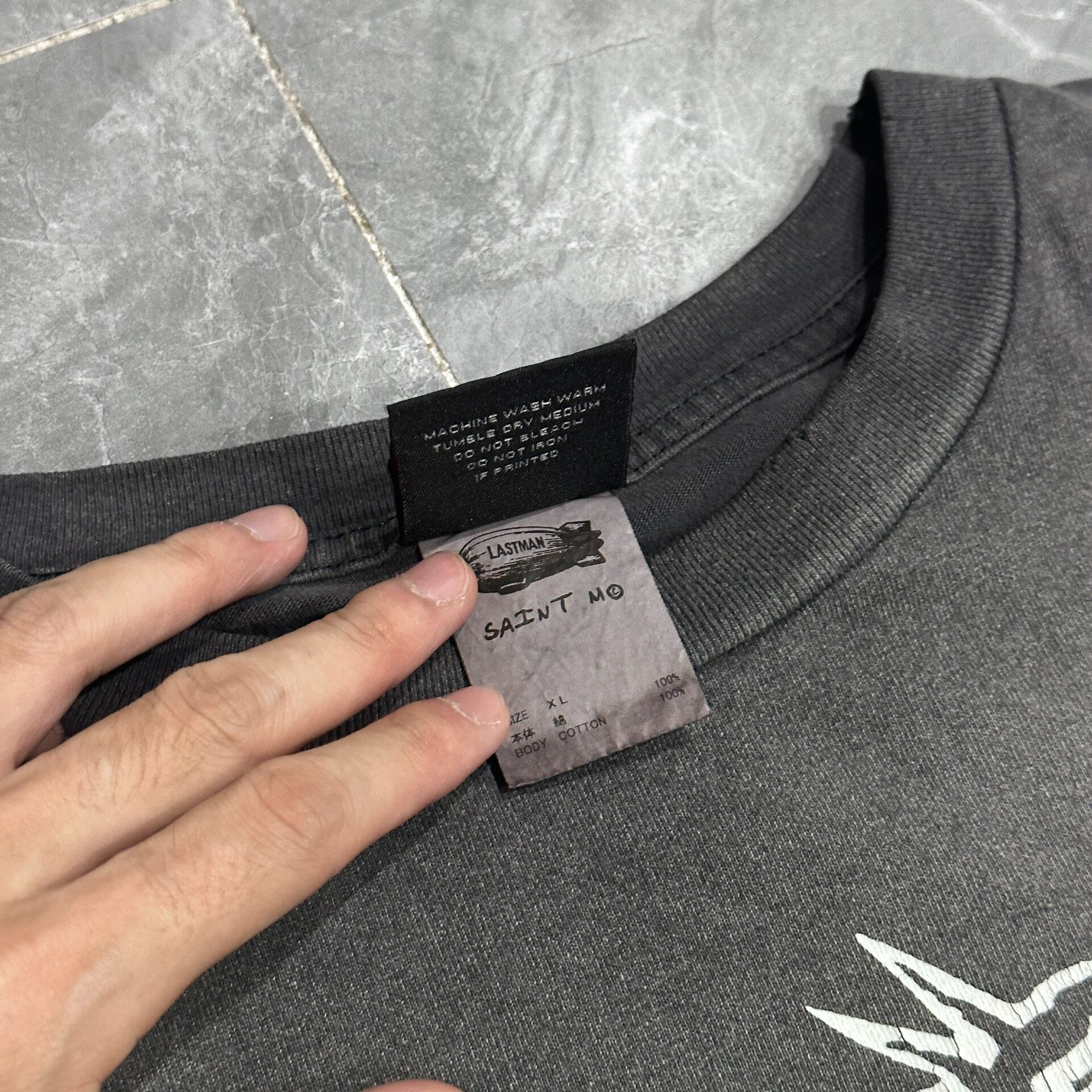 Saint Michael SS24 Lastman Jesus Wash Tee — label