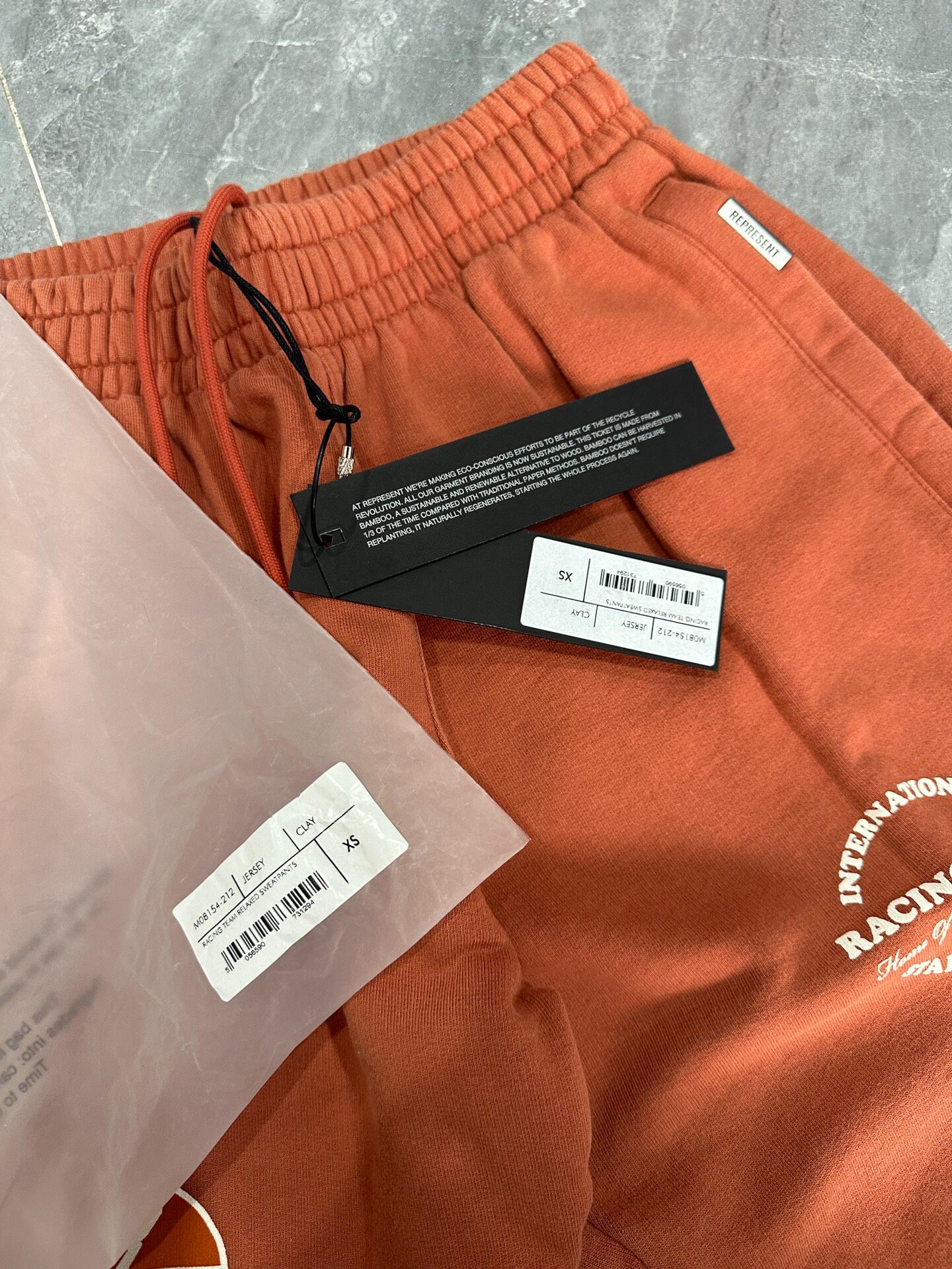 Represent Orange Drawstring Pants — front