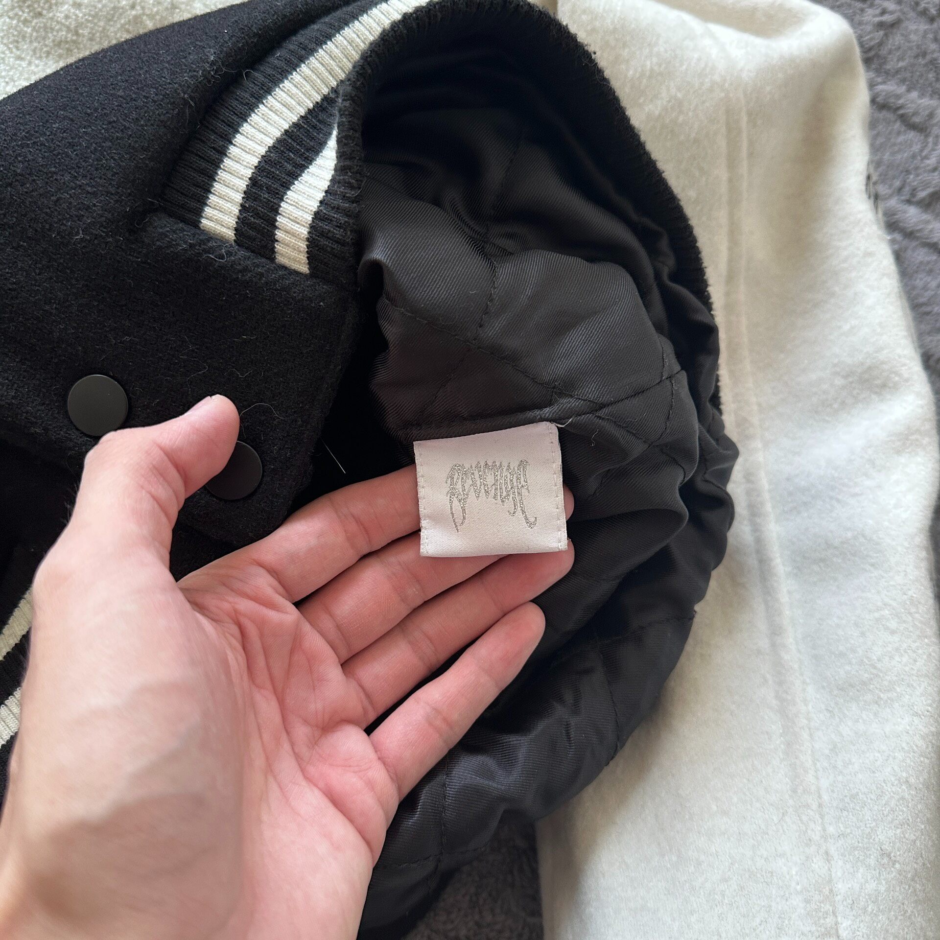Revenge Skull Embroidered Varsity Jacket — label