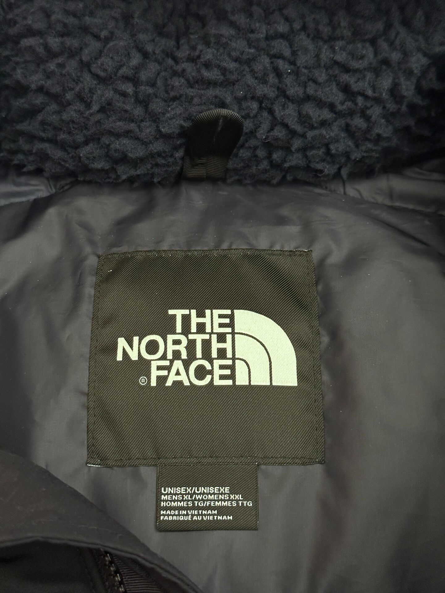 The North Face Navy Fleece Down Jacket — detail