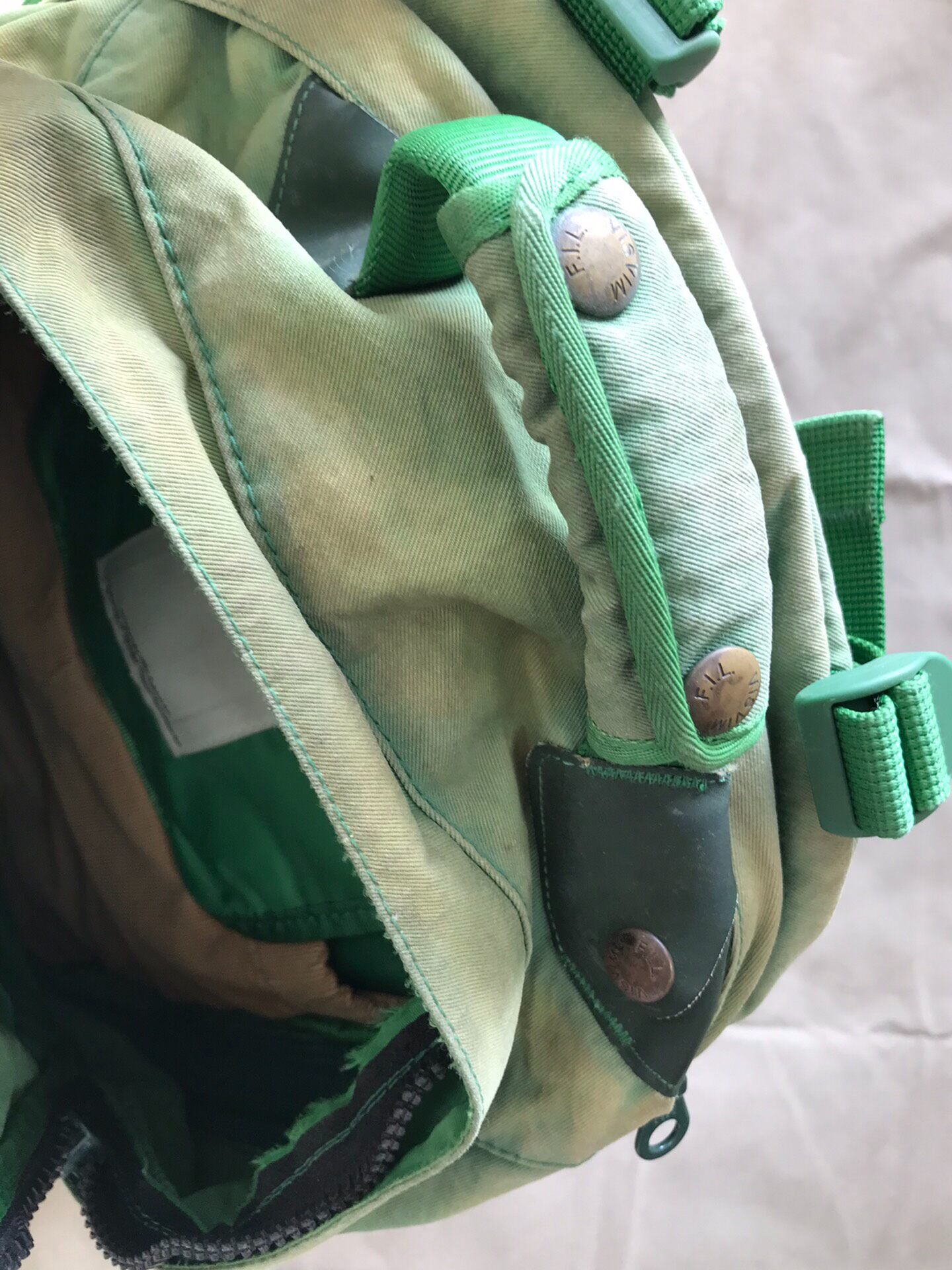 Visvim Lamina 22L Teal Backpack — label