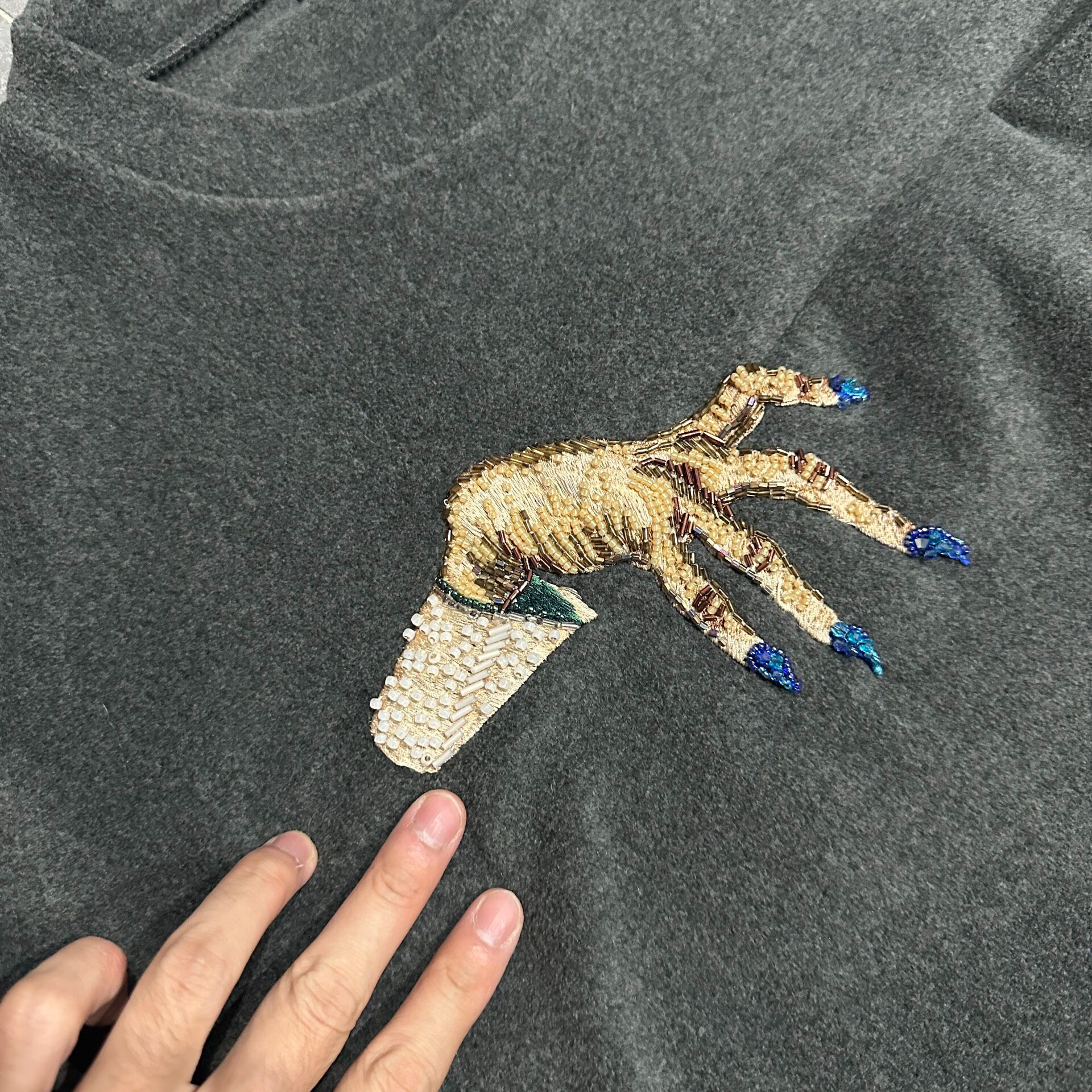 Undercover Beaded Claw Crewneck Sweatshirt — detail