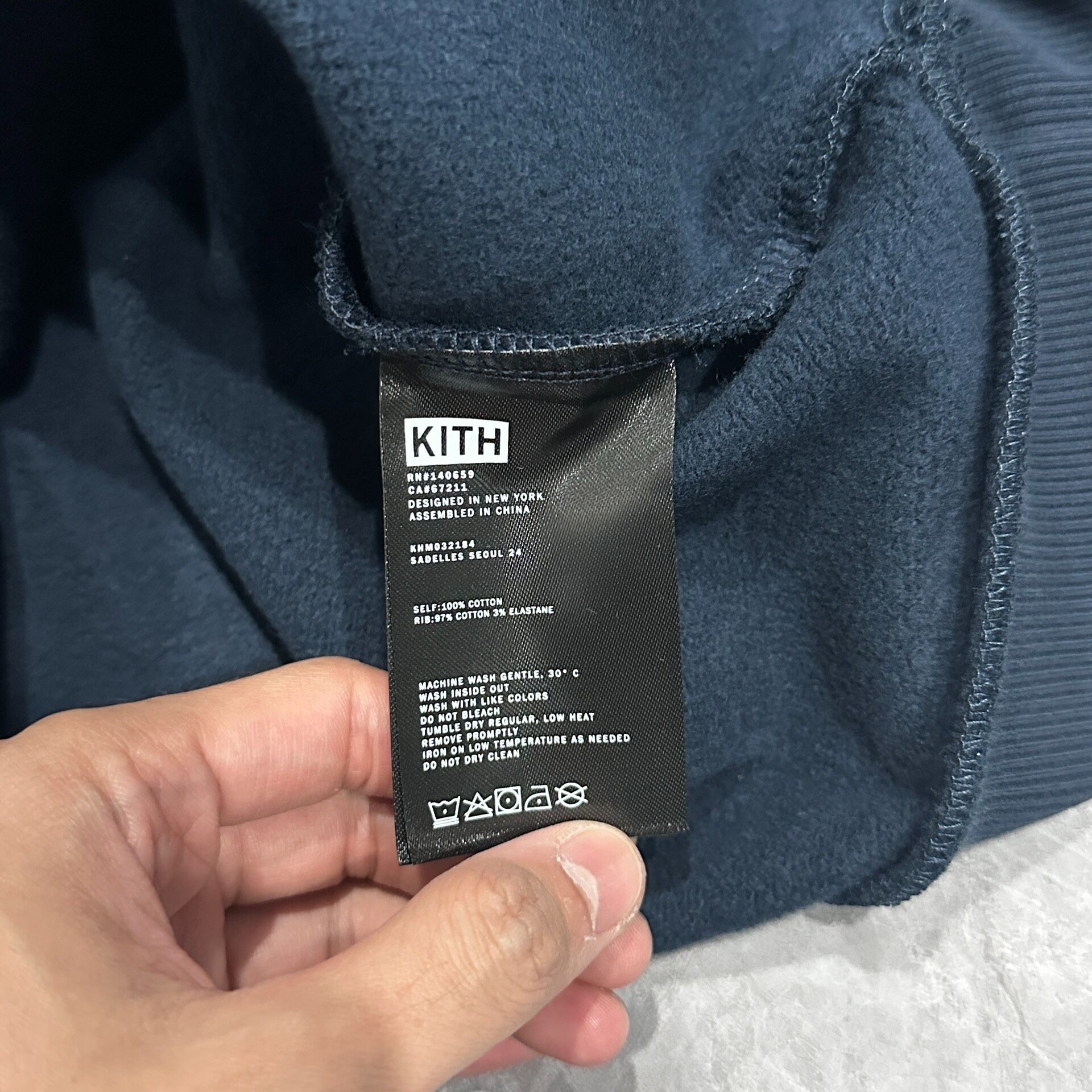 Kith Sadelles Seoul Navy Crewneck Sweatshirt — label