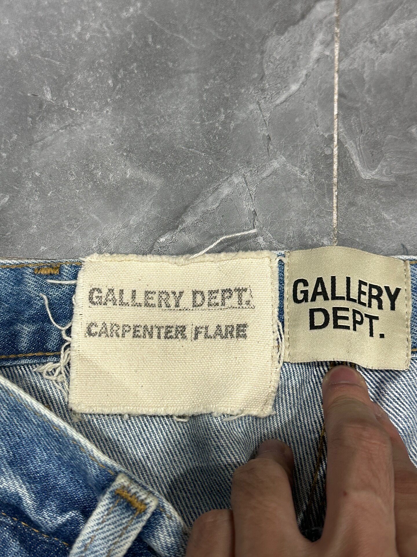 Gallery Dept Distressed Flared Jeans — label