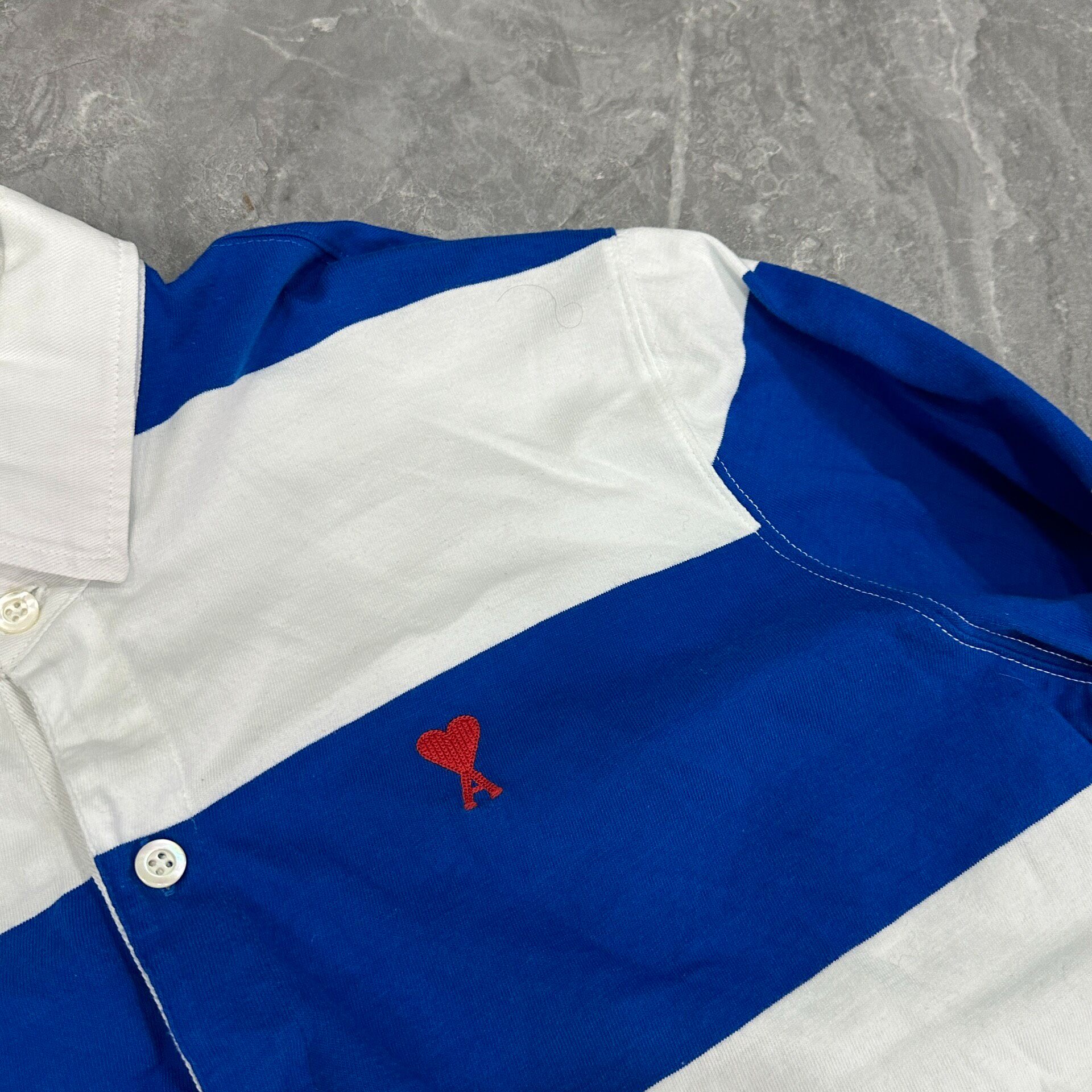 AMI Blue White Striped Heart Polo Shirt — front