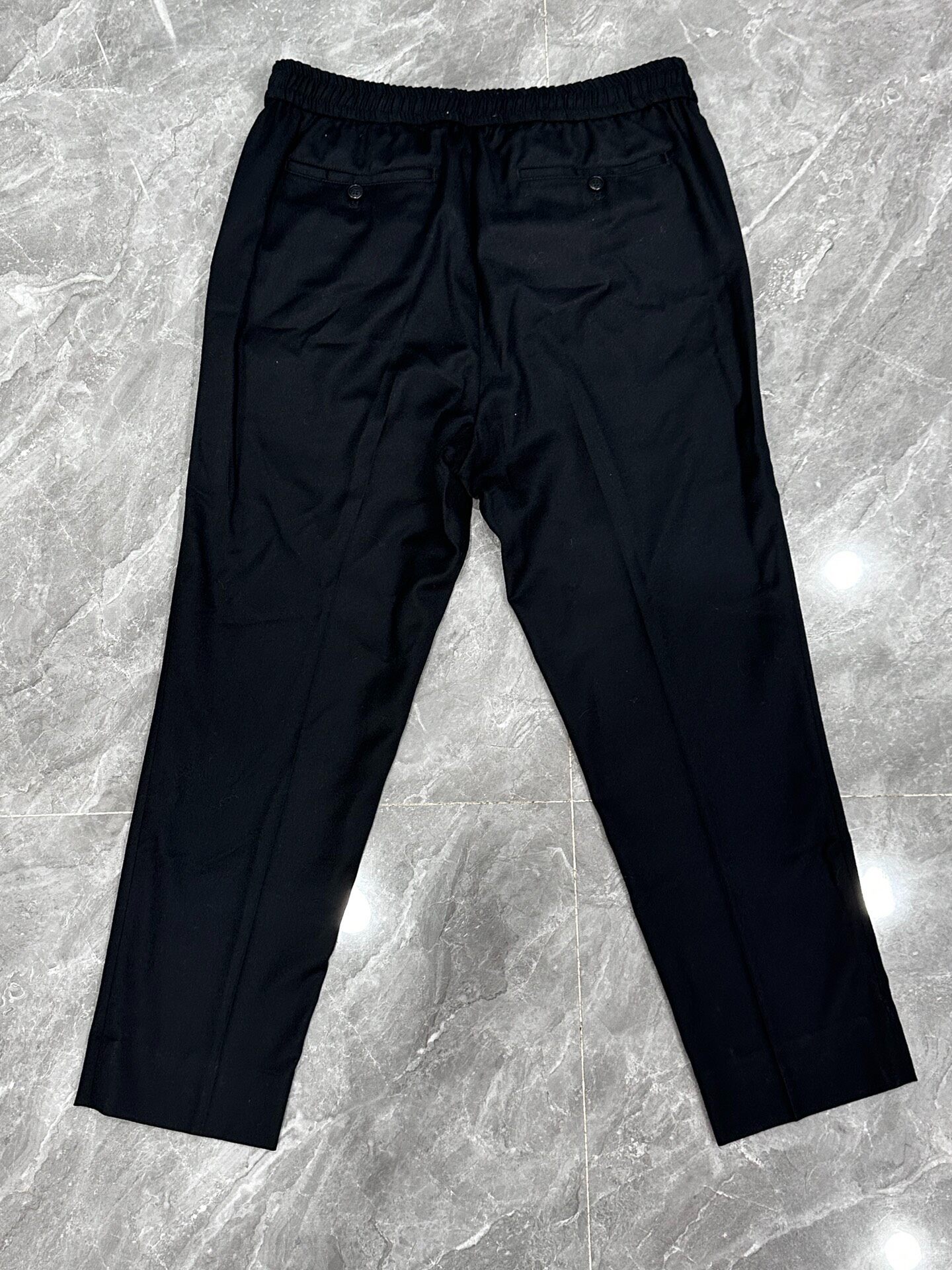 AMI Black Wool Slim Tailored Trousers — front