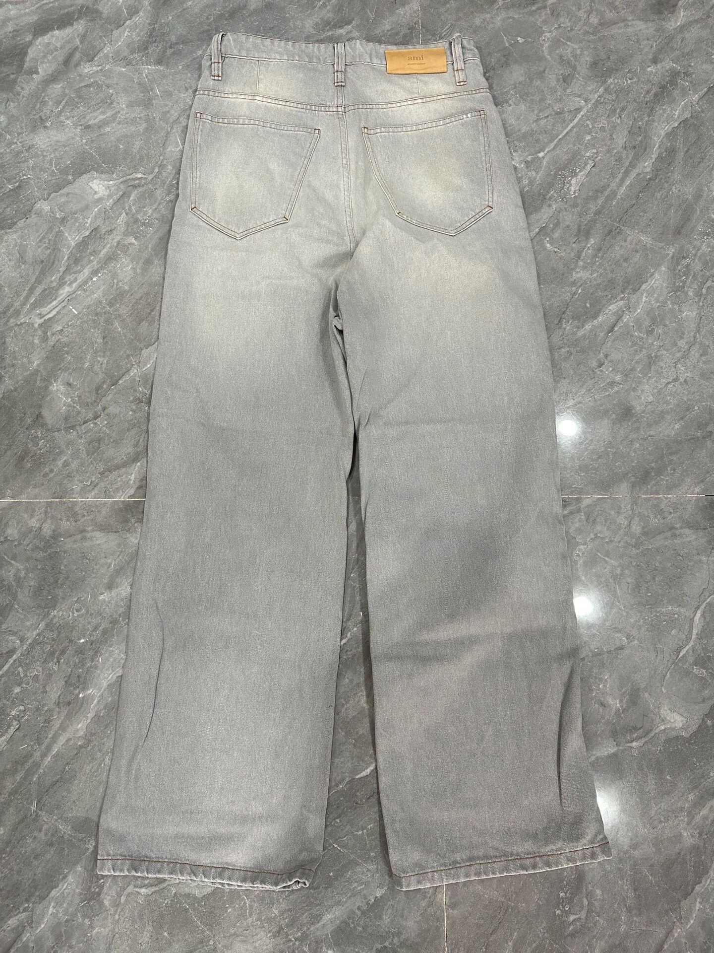 AMI Wide-Leg Micro-Flared Denim Jeans — front