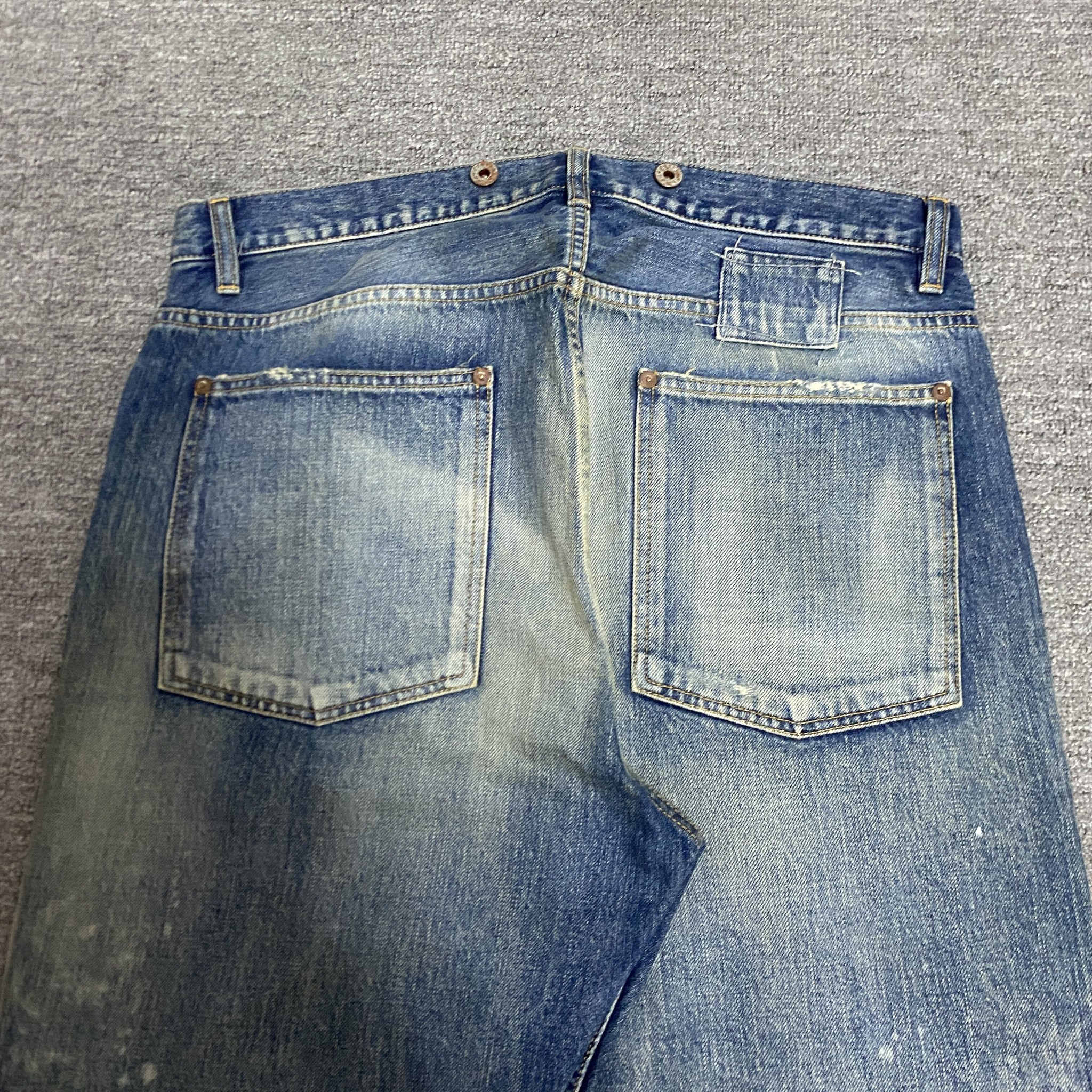 MADNESS 23AW Acid Wash Denim Jeans — detail