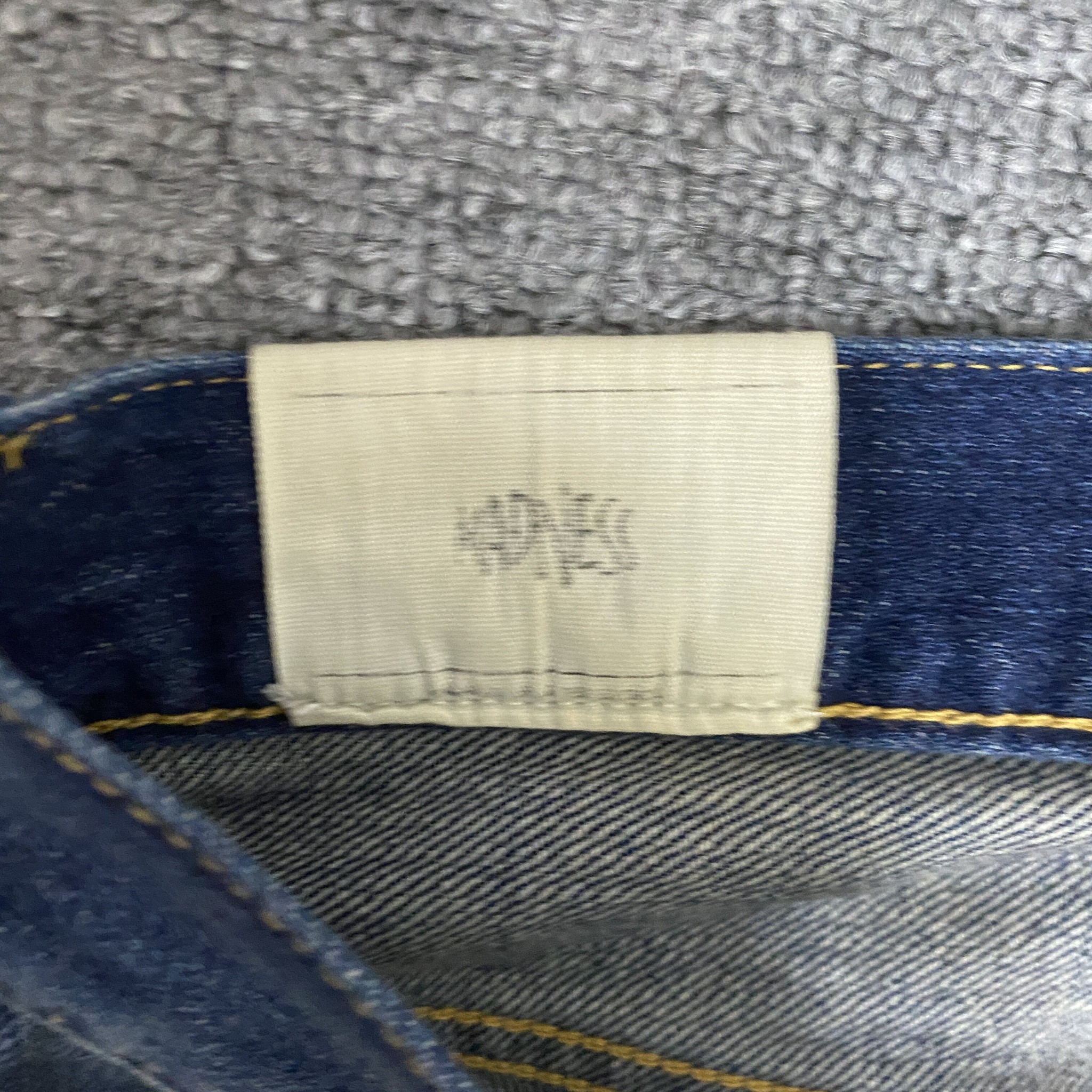 MADNESS 23AW Washed Denim Jeans — back