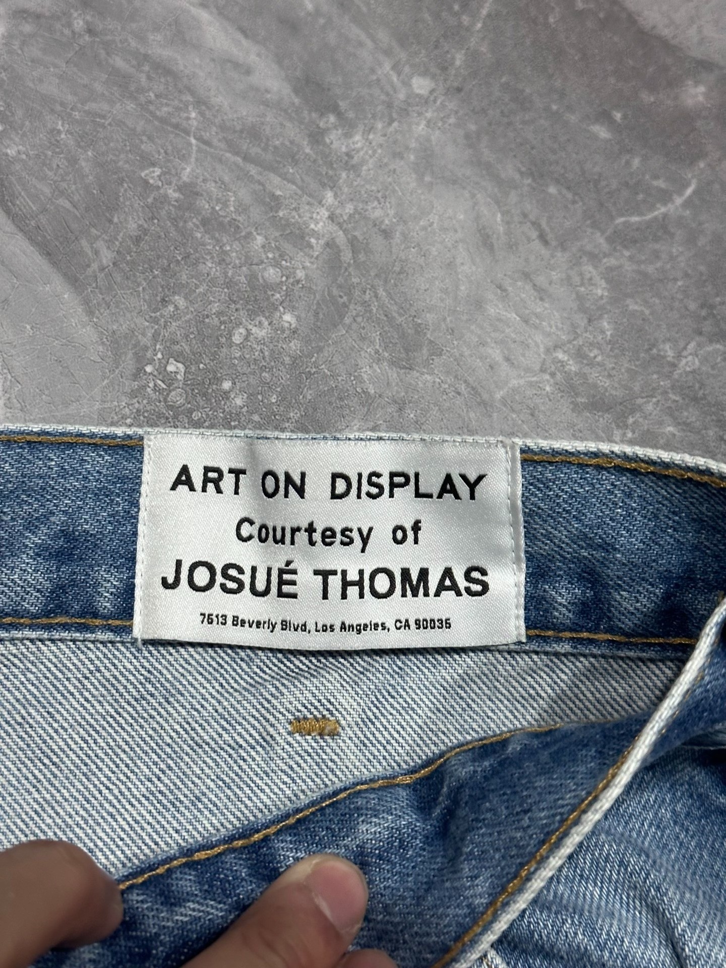 Gallery Dept Flared Distressed Blue Jeans — label