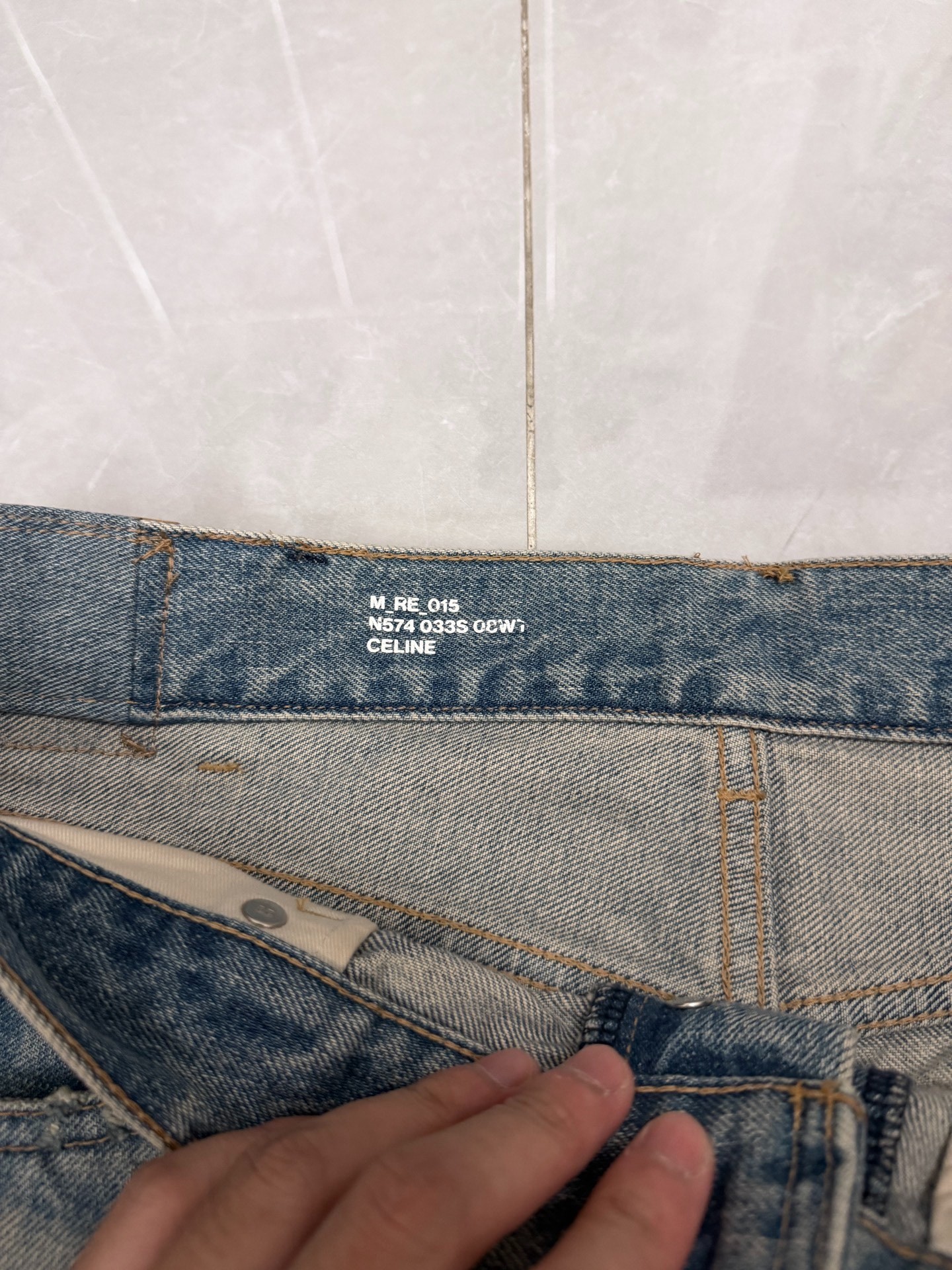 Celine SS23 Men’s Loose Ripped Jeans — detail