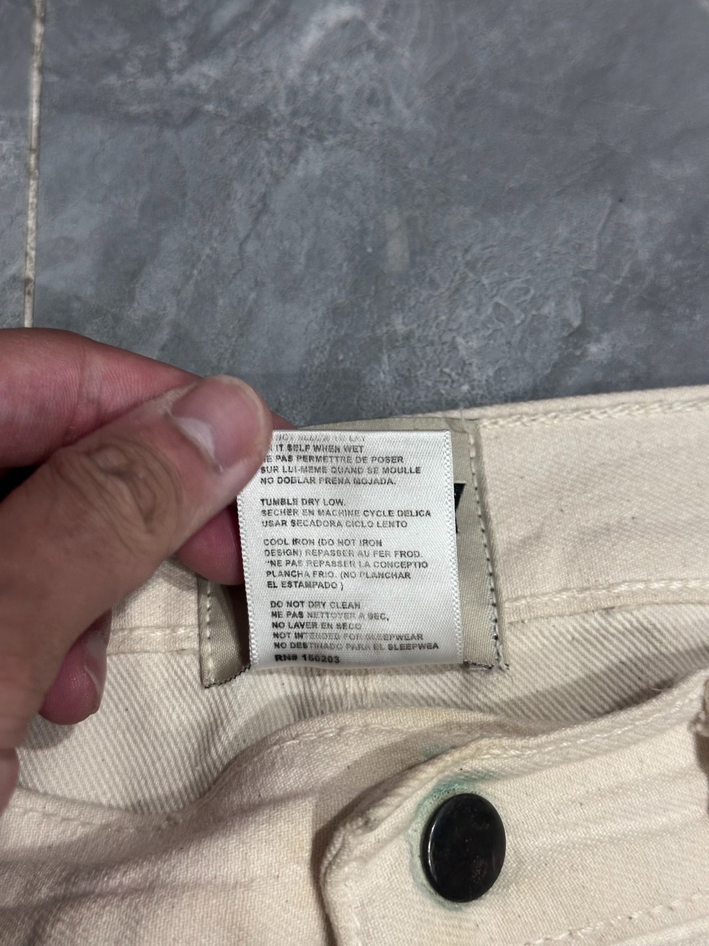 Gallery Dept Paint-Splatter Flared Jeans — label