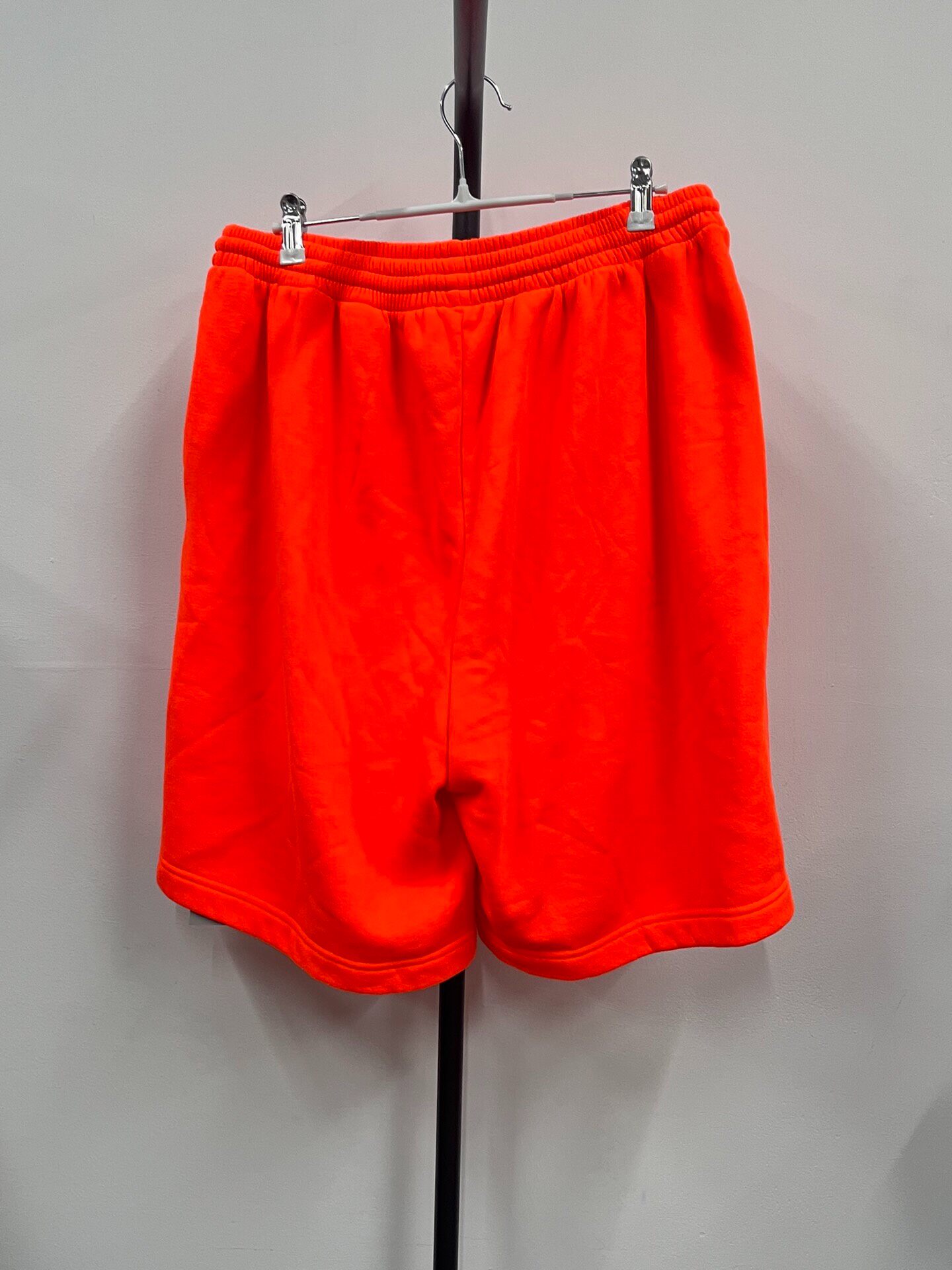 Balenciaga Neon Orange Sweat Shorts — front