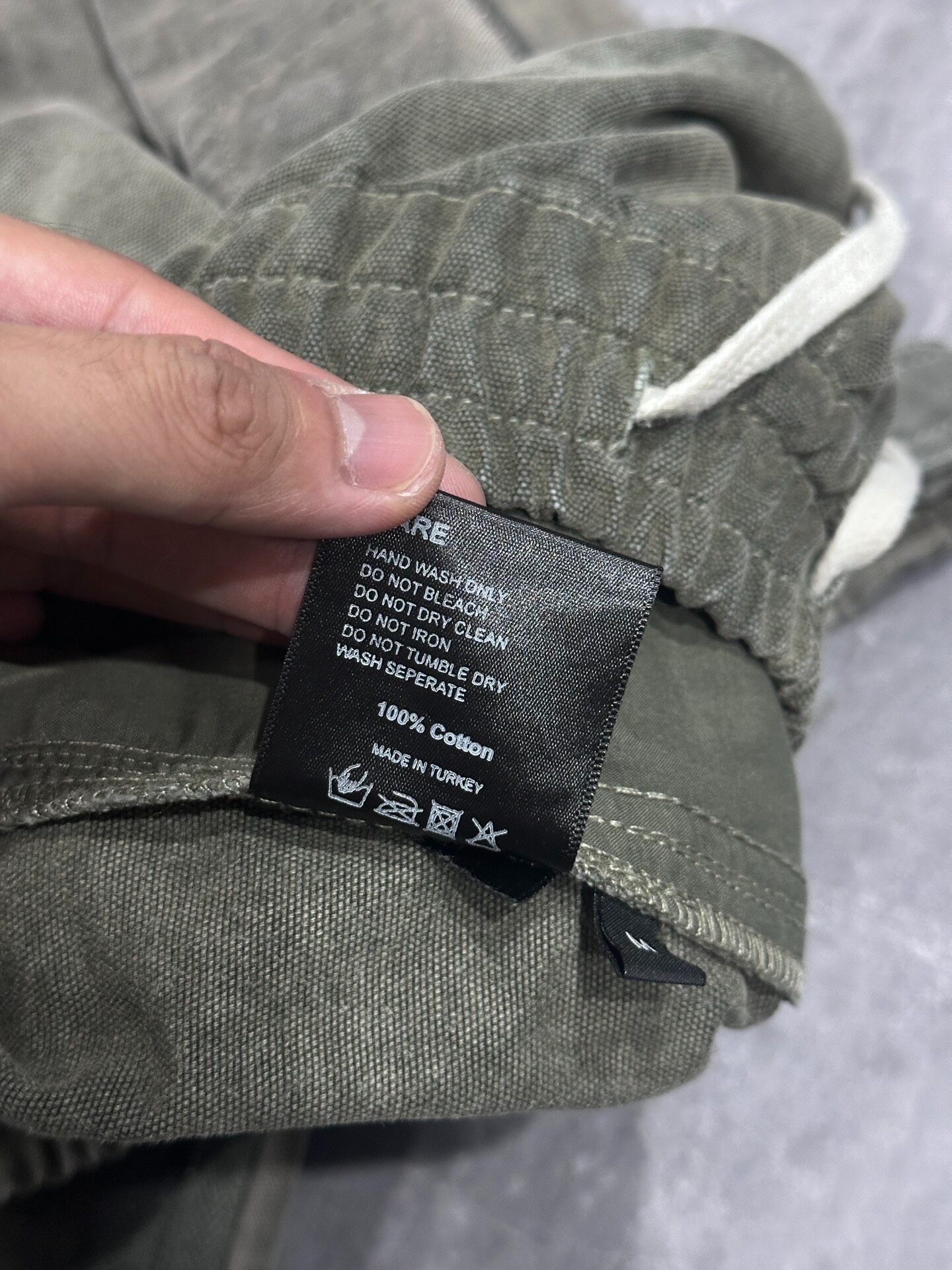 Askyurself Faded Green Cargo Pants — label