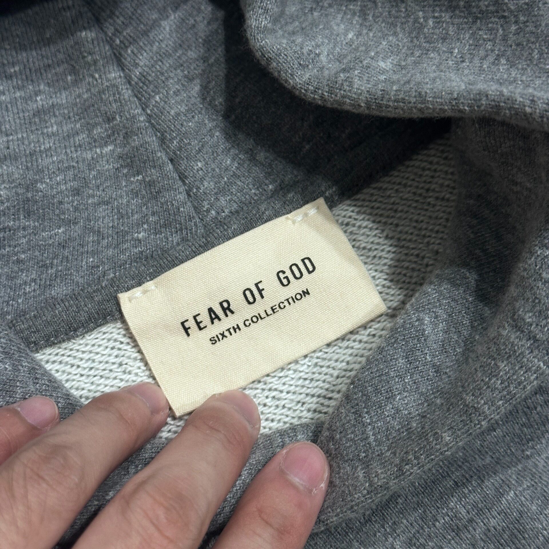 Fear of God Gray Flocked FG Hoodie — label