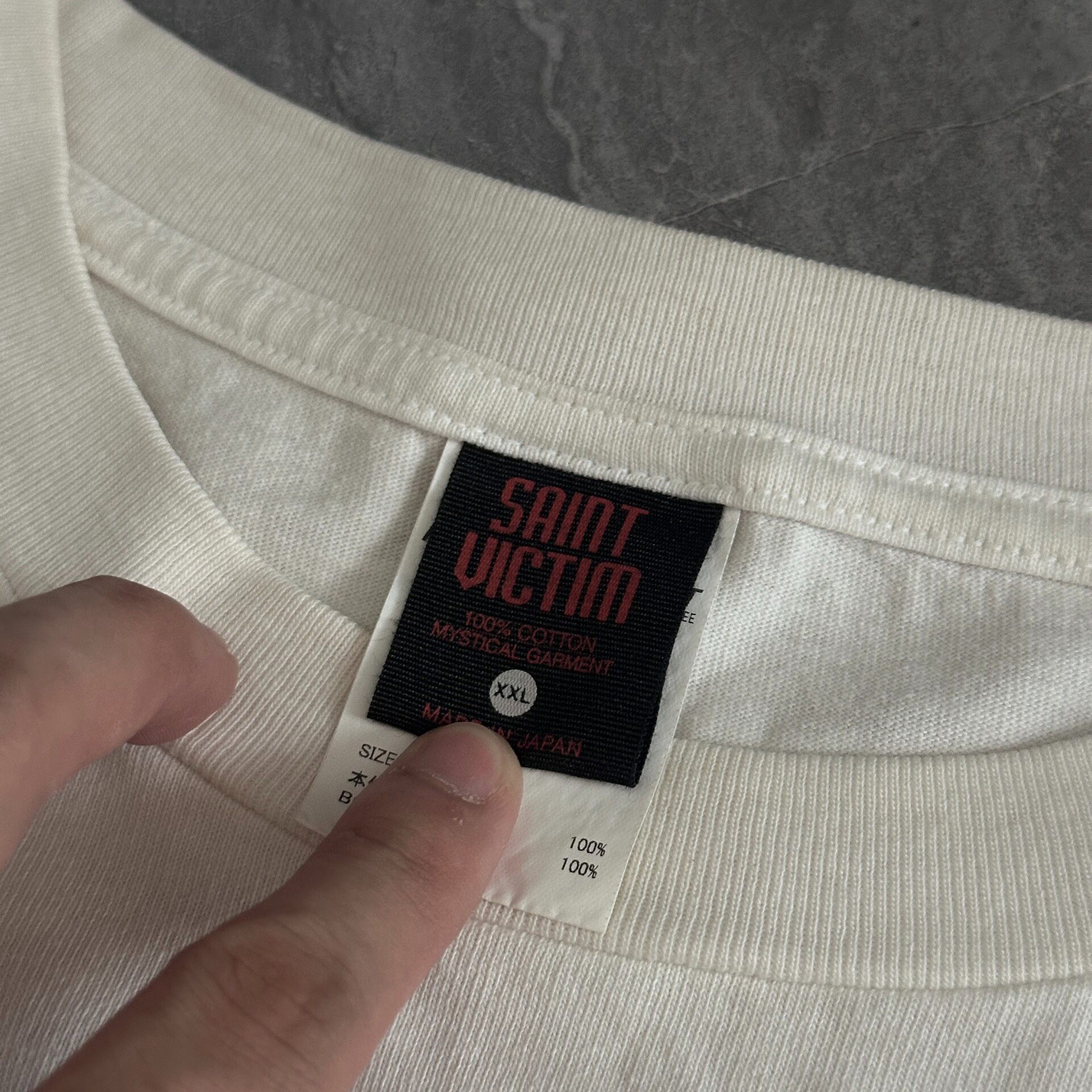 Saint Michael Faded White Astronaut Tee — back