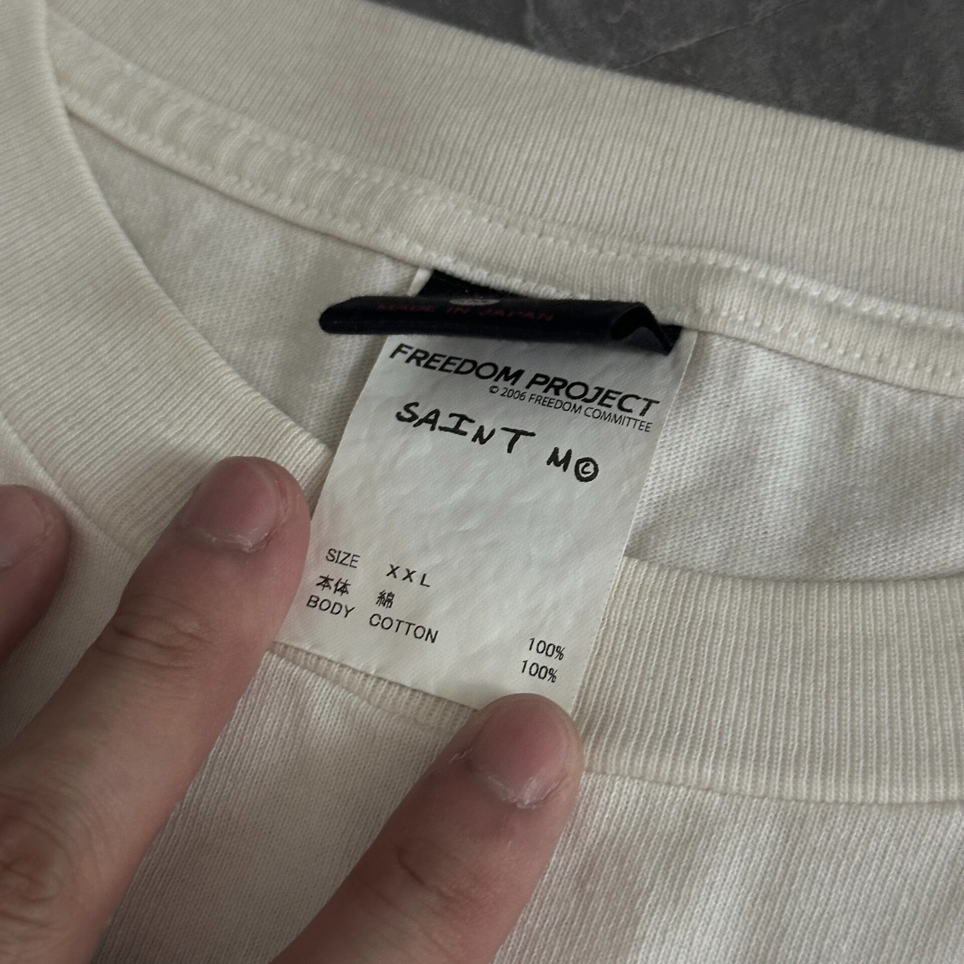 Saint Michael Faded White Astronaut Tee — label