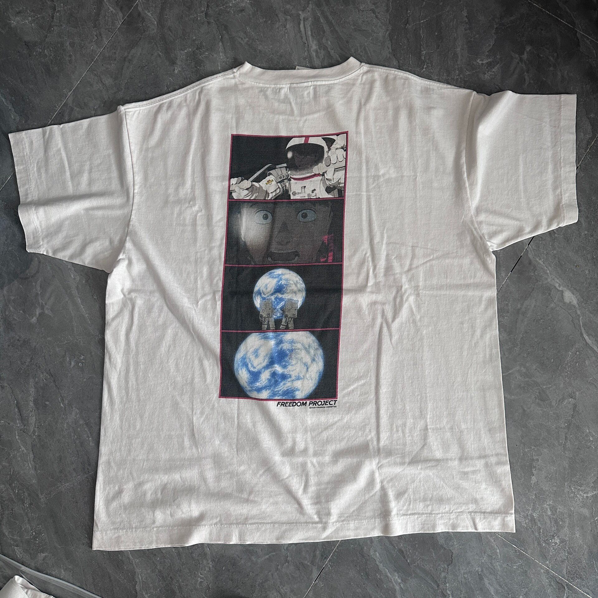 Saint Michael Faded White Astronaut Tee — front