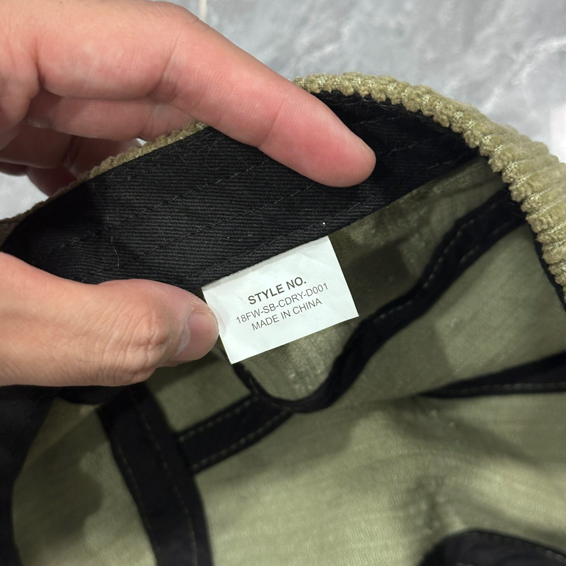 Madness MDNS Olive Corduroy Baseball Cap — label