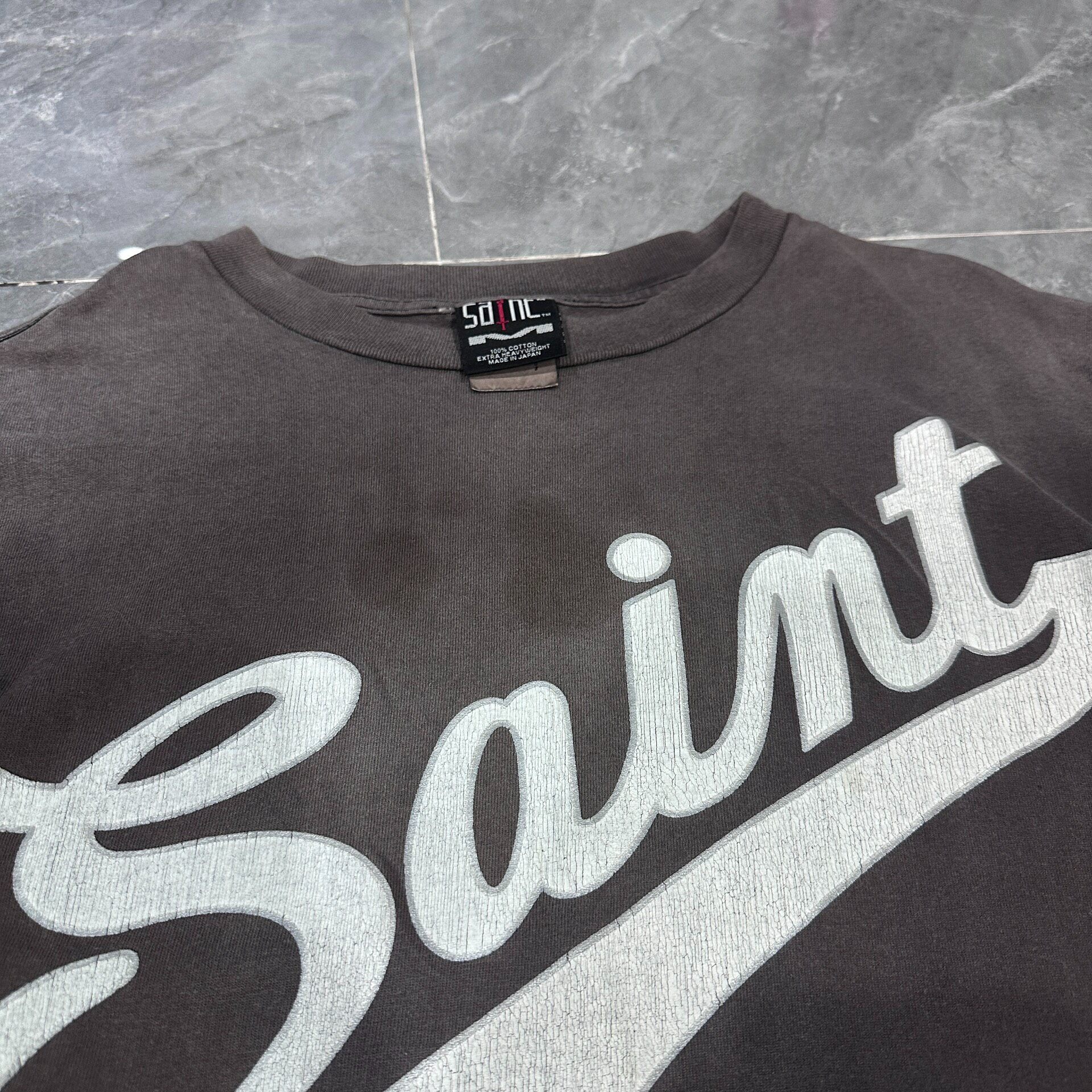 Saint Michael Faded Target Script Tee — back