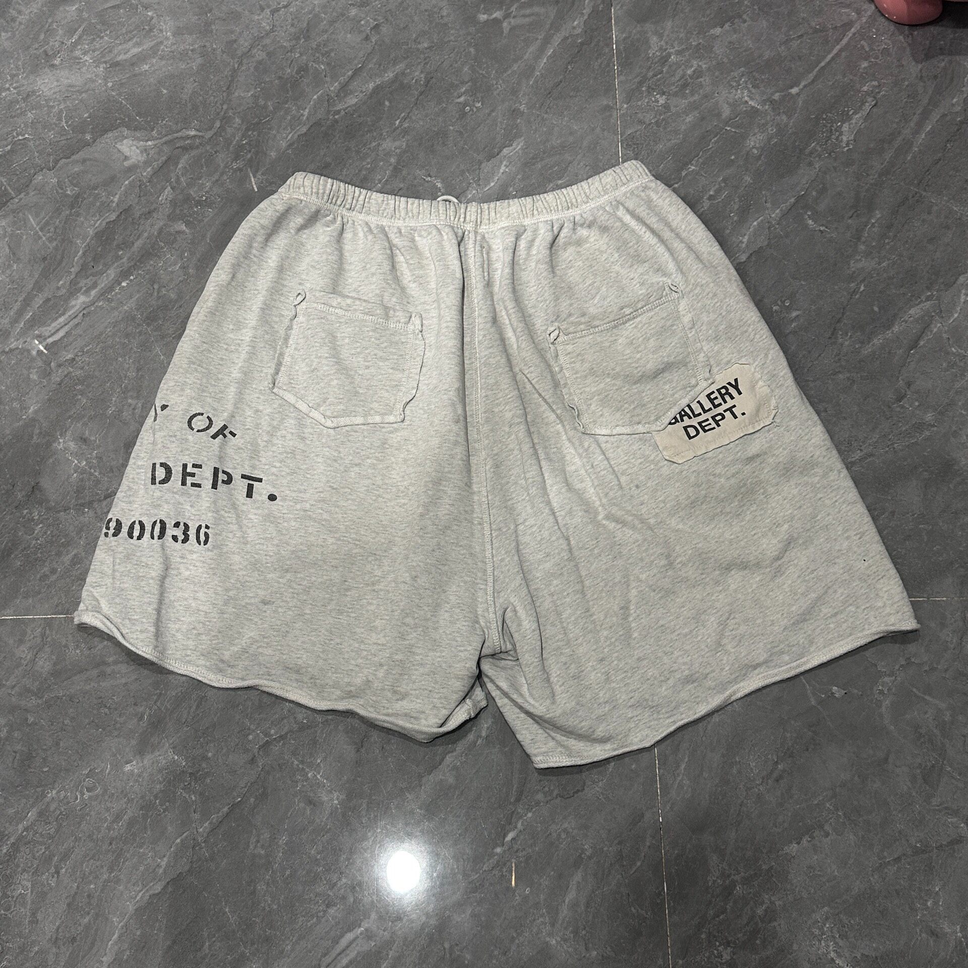 Gallery Dept Distressed Patch Shorts — front