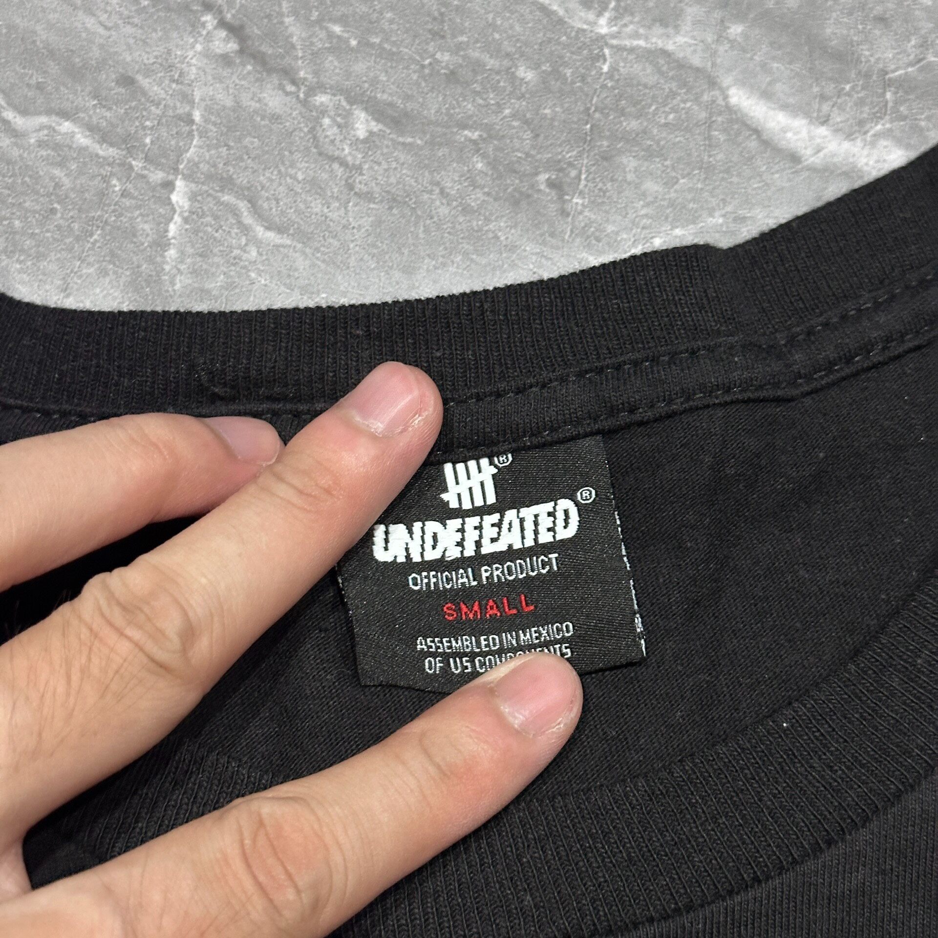 Undefeated Graphic Logo Short-sleeve T-shirt — label