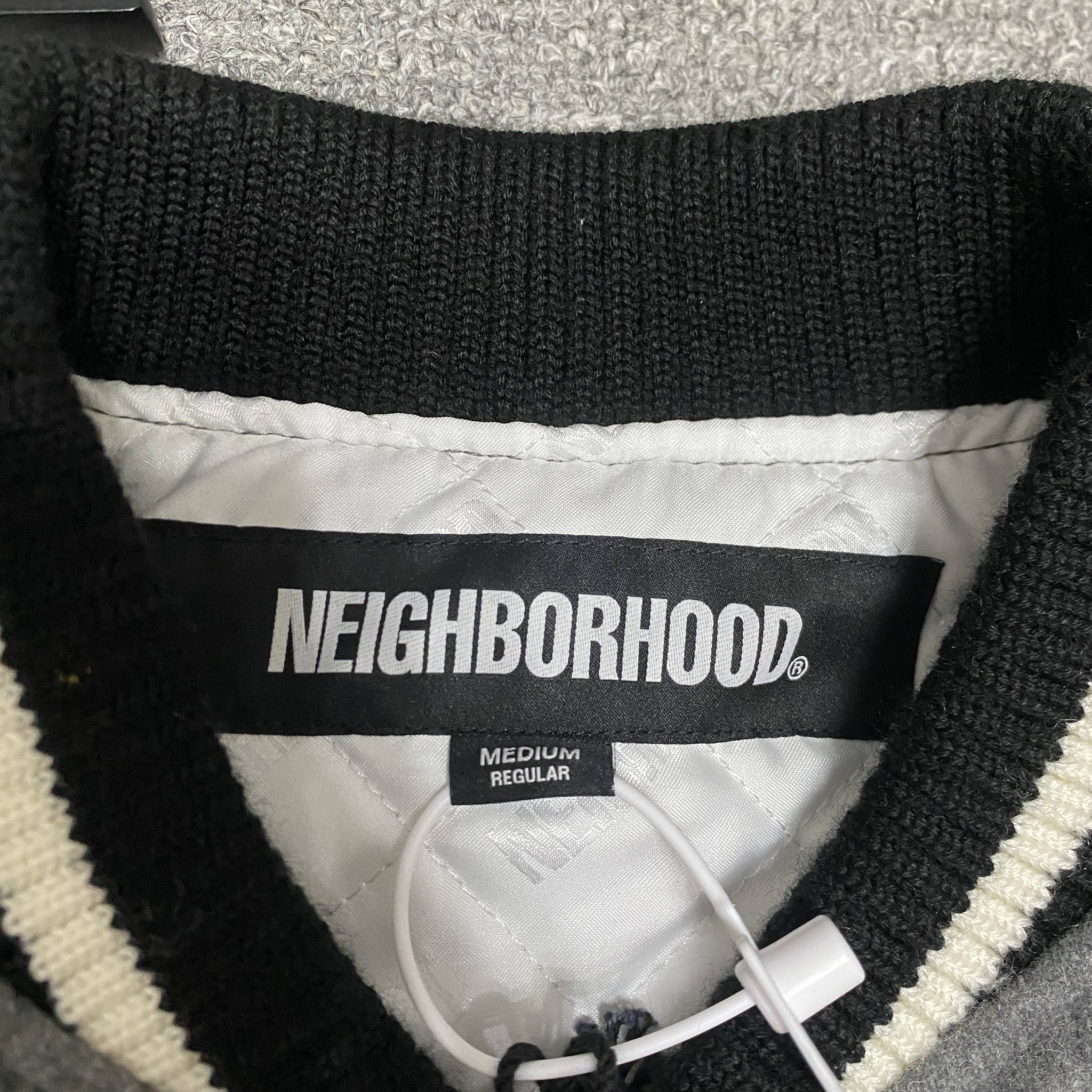 NEIGHBORHOOD 23AW Leather Sleeve Varsity Jacket — label
