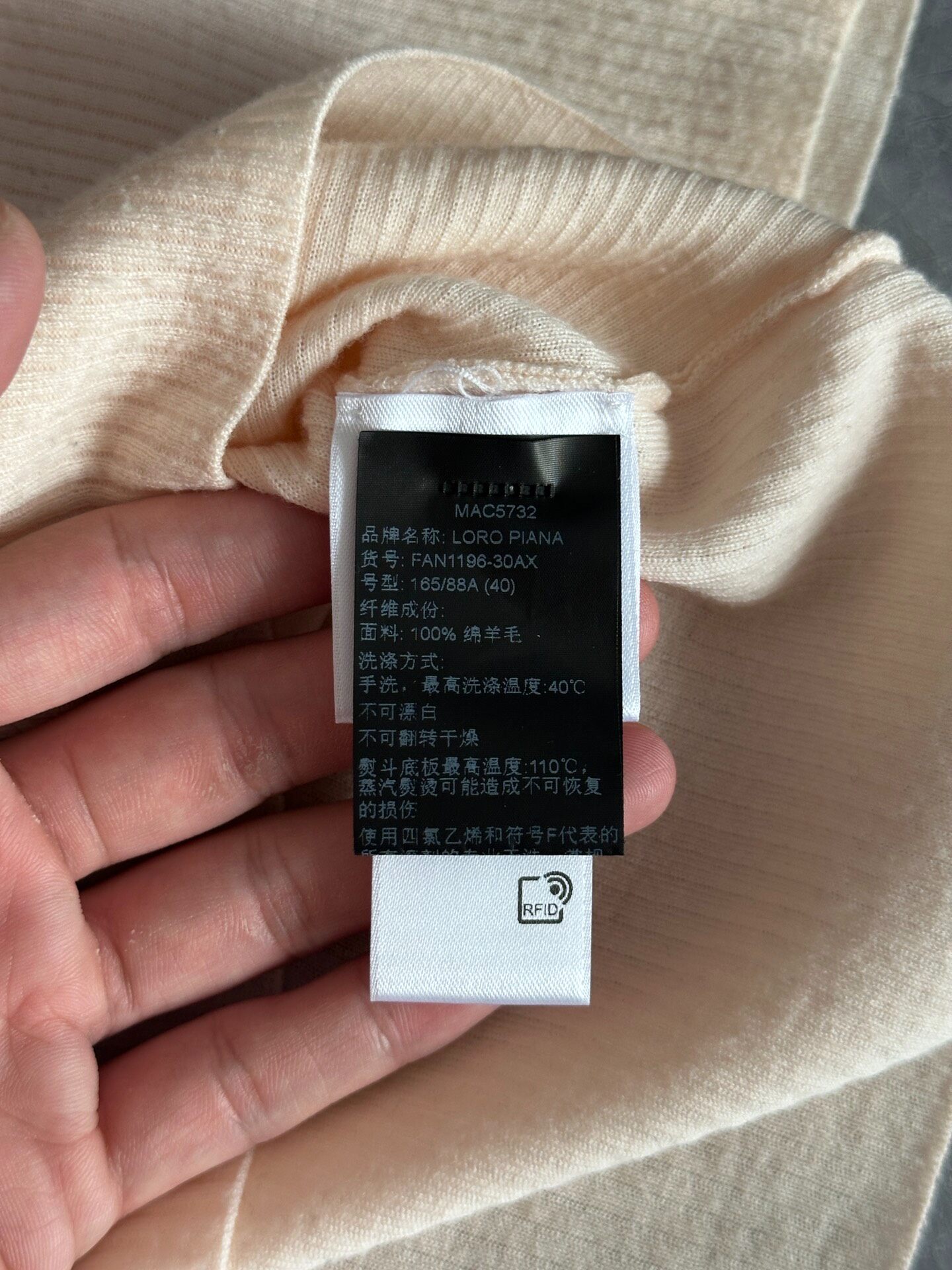 Loro Piana Pale Pink Turtleneck Sweater — detail
