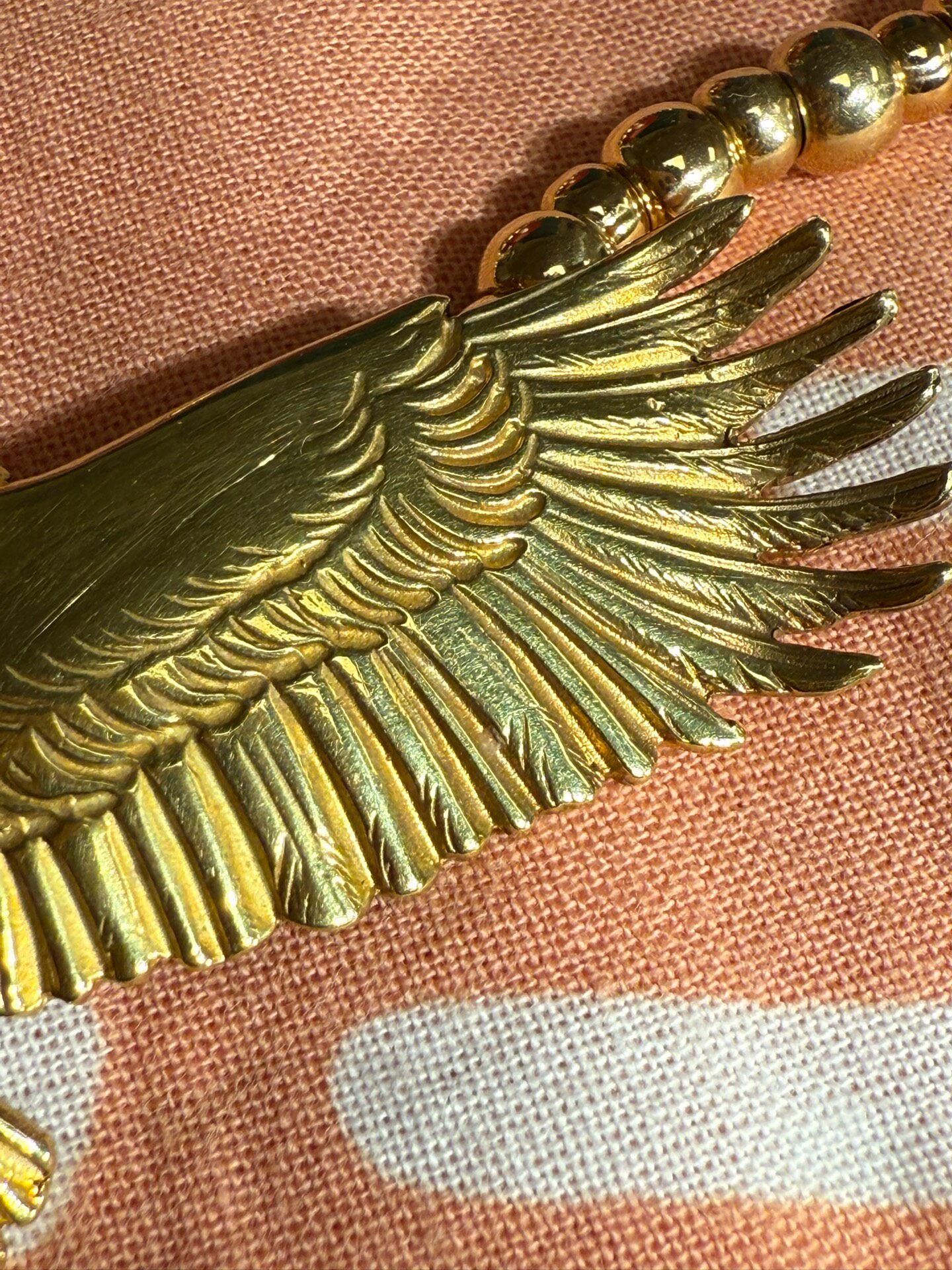 Tadyking Gold Eagle Beaded Necklace — label