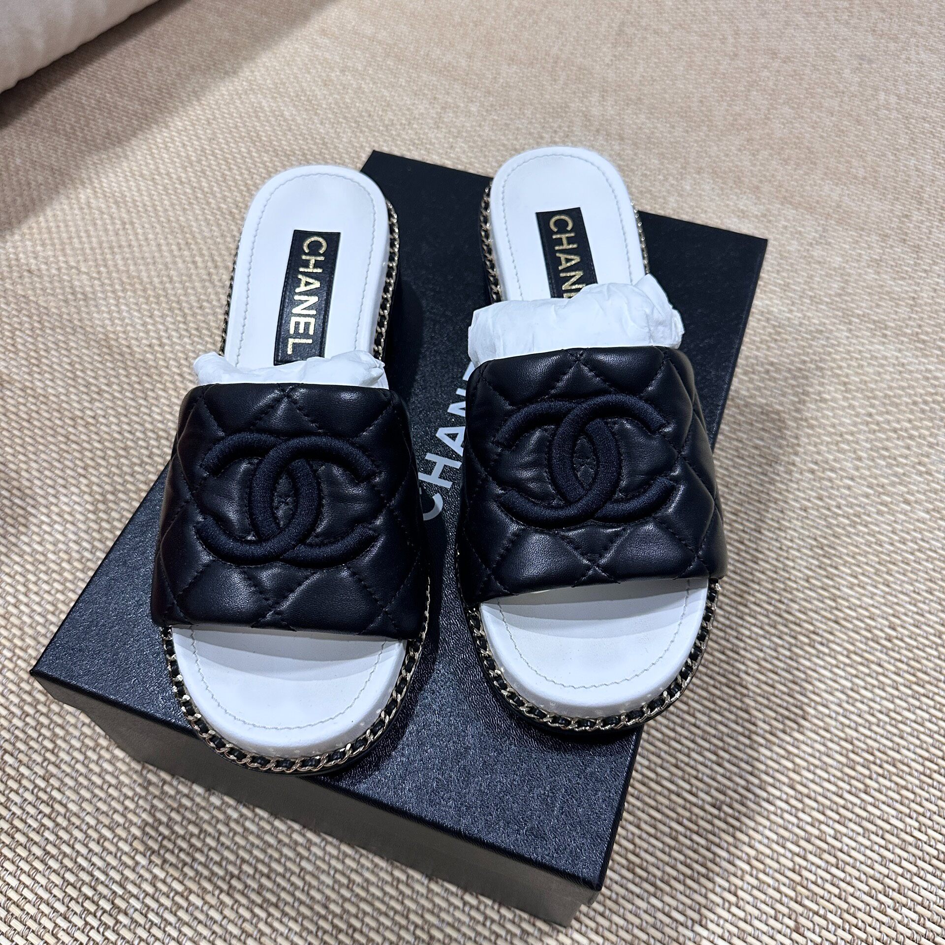 Chanel 25P Black Quilted Slide Sandals — front