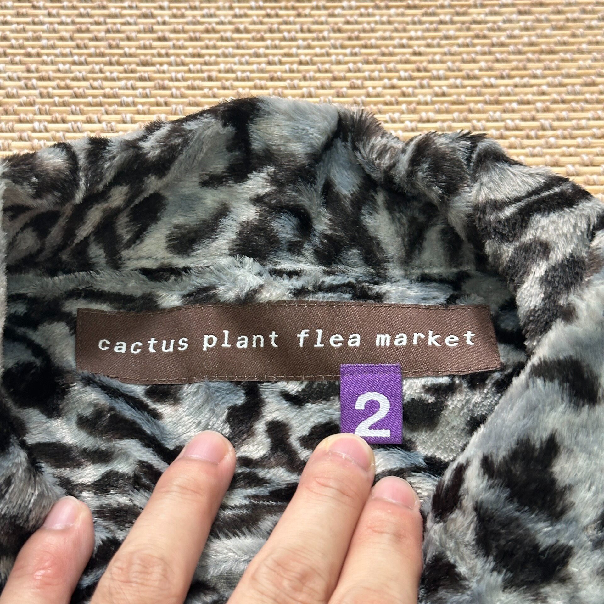 CPFM Leopard Smile Zip Jacket — label