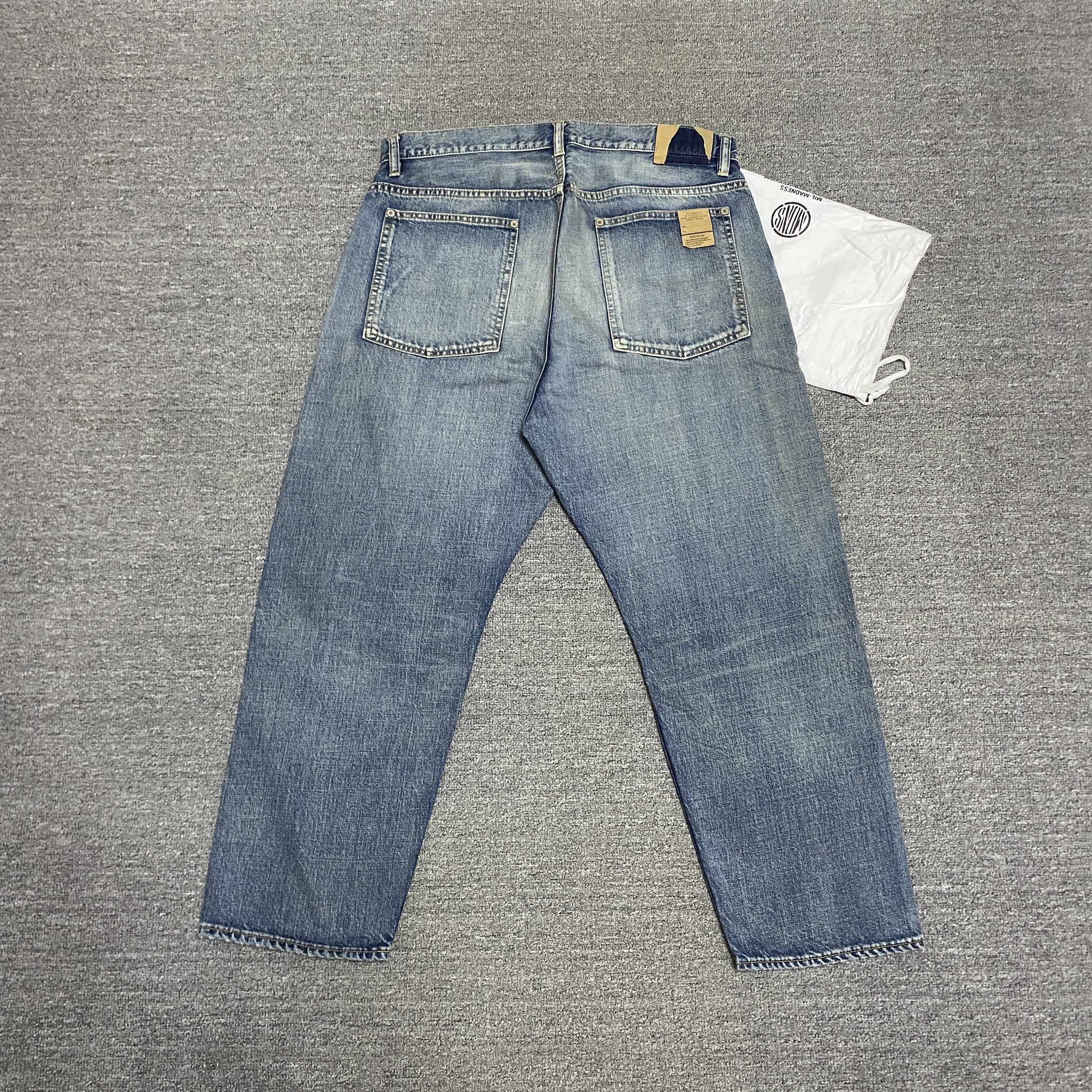 MADNESS 22SS Knee Rip Denim Jeans — detail