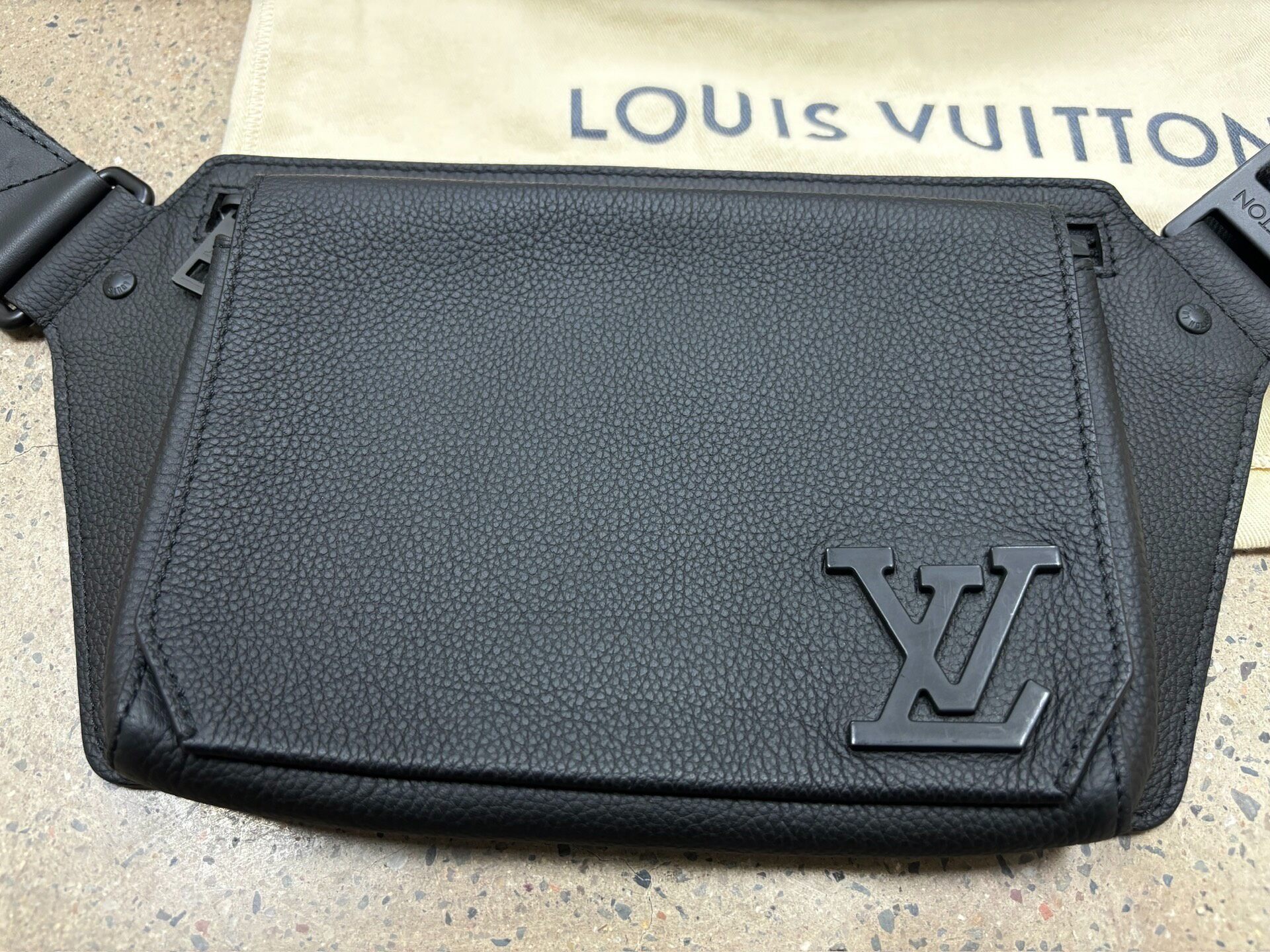 Louis Vuitton Takeoff Sling Bag — front