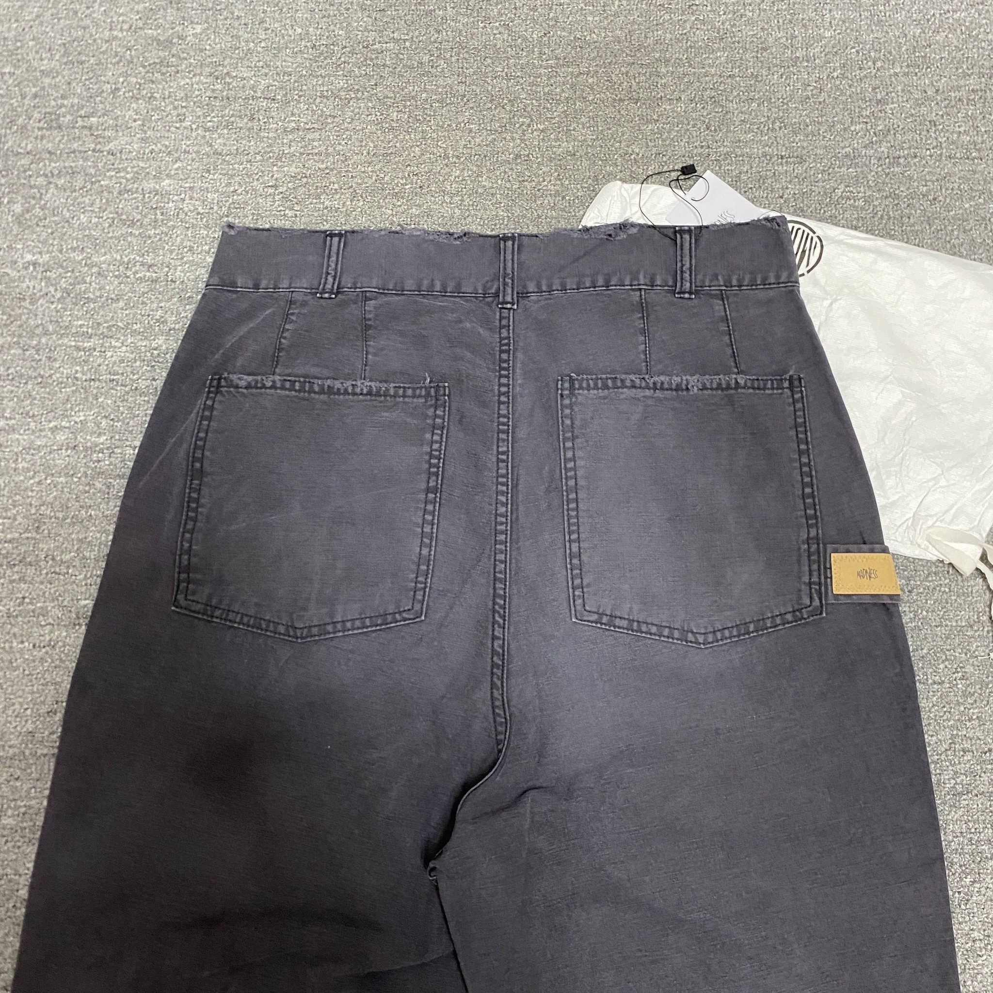 MADNESS 22SS Washed Casual Pants — label