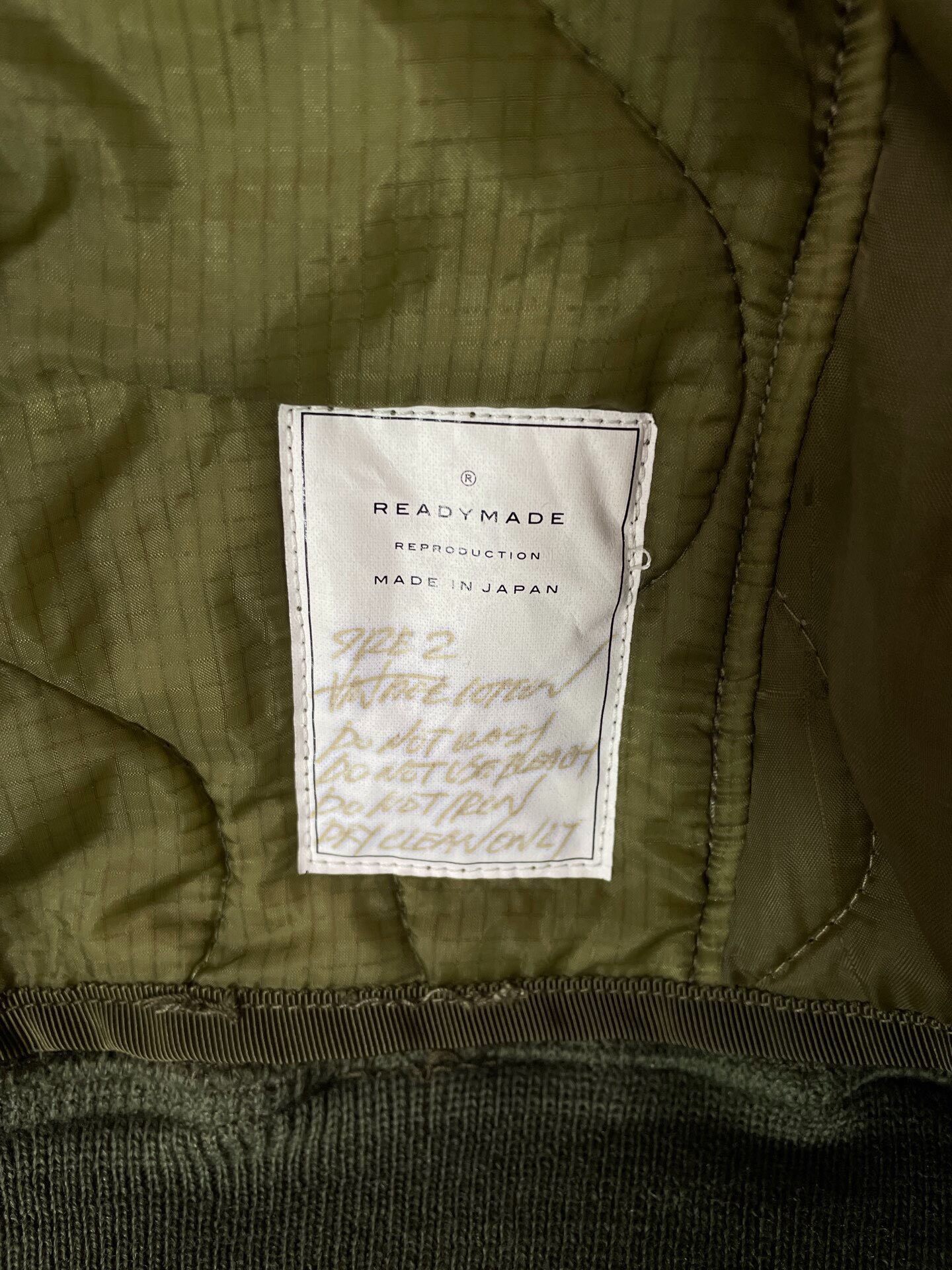 Readymade Hand-Embroidered Bomber Jacket — label