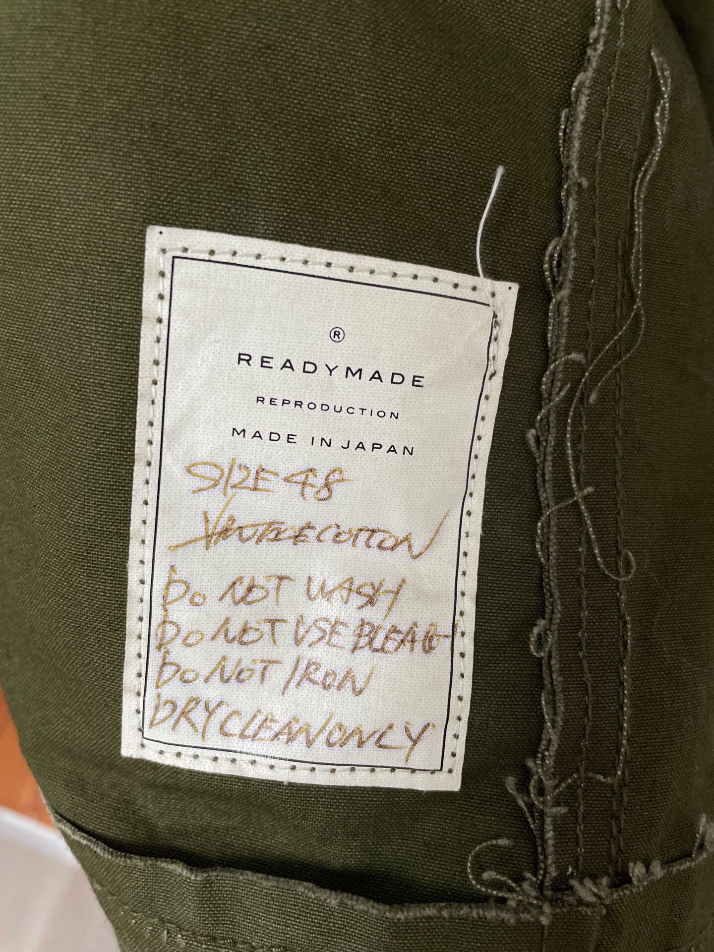 Olive Green Military Jacket — label