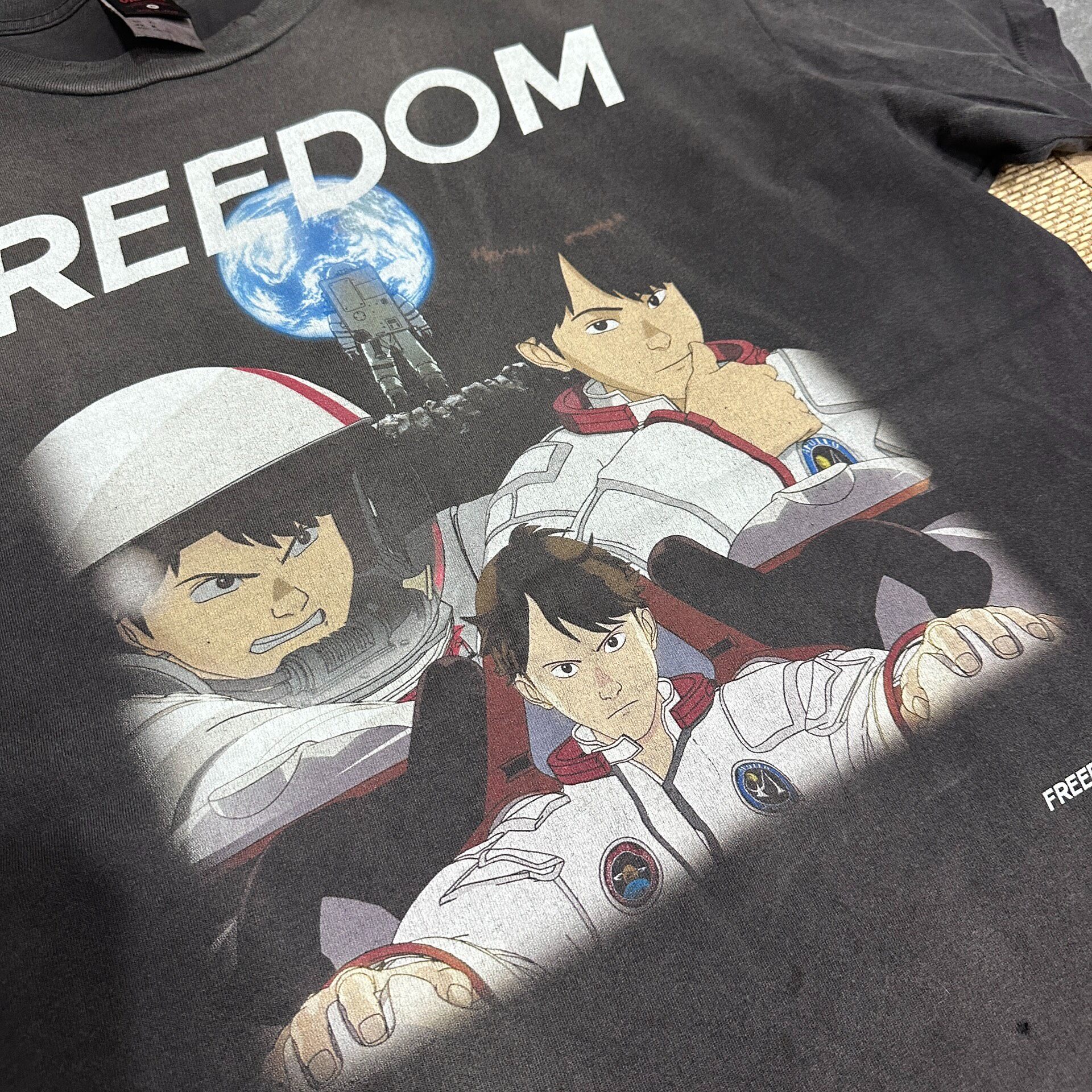 Saint Michael Freedom Astronaut Washed Tee — detail