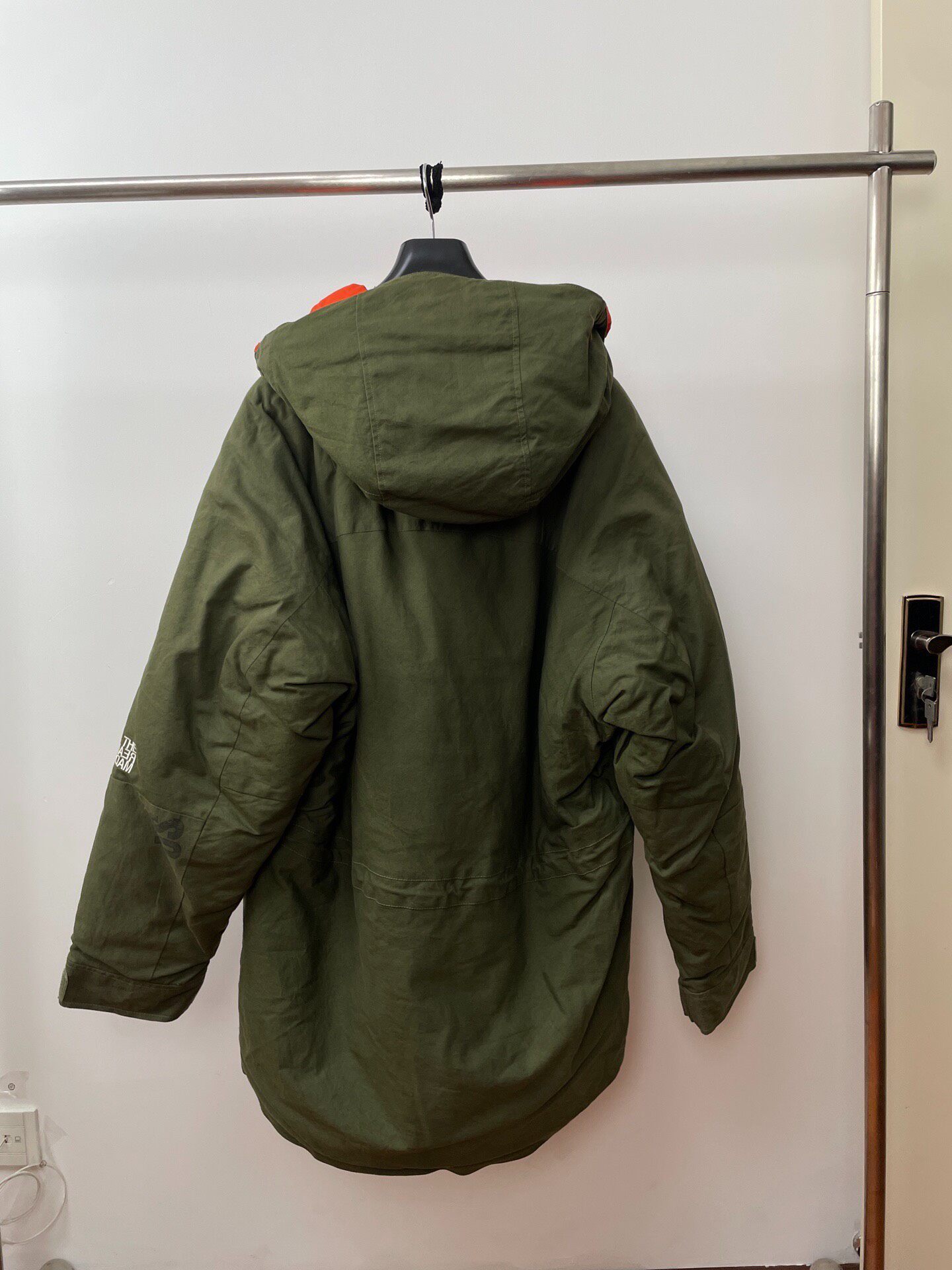Olive Green Parka With Orange Lining — front