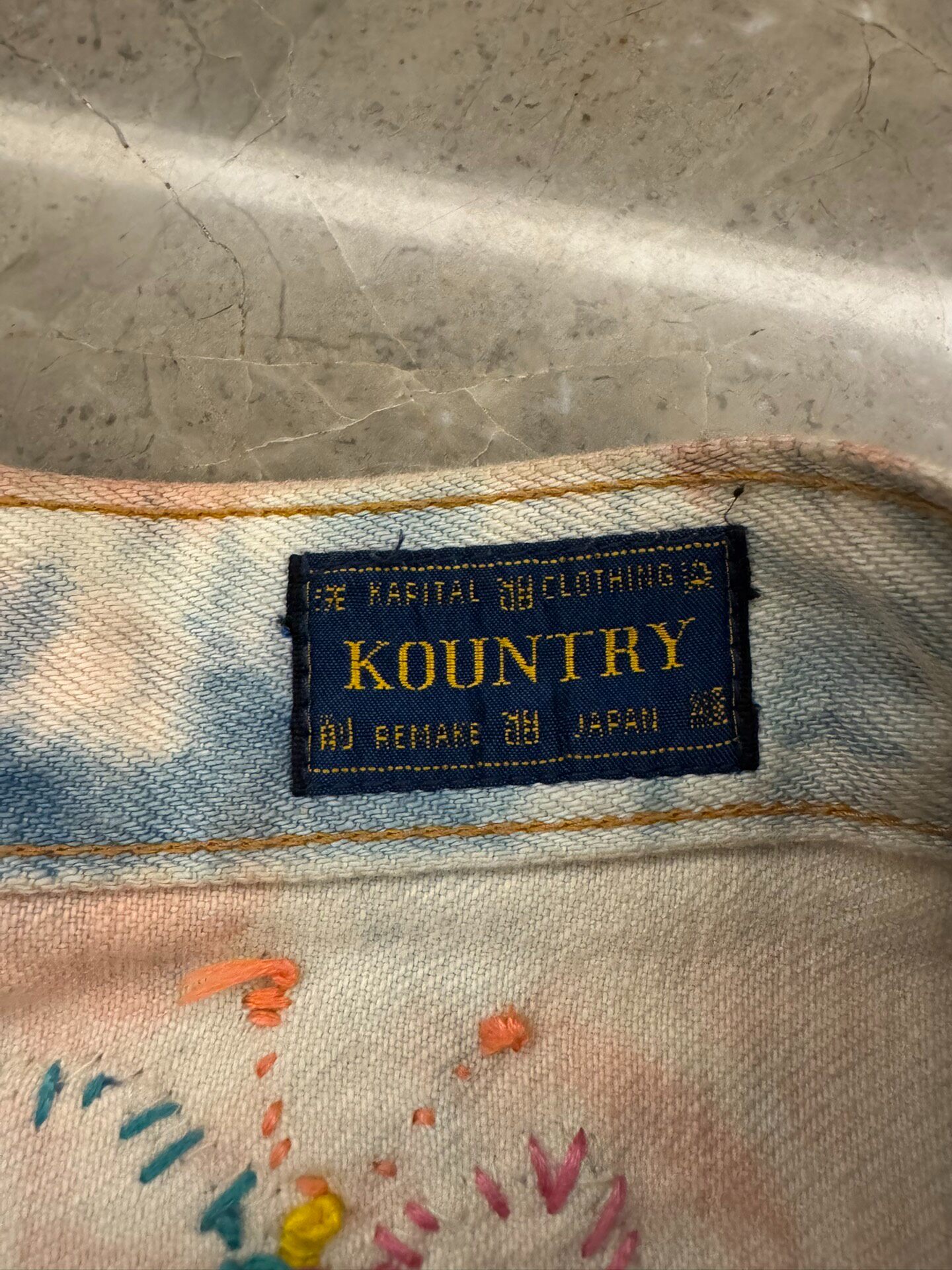 Kapital 23SS Limited Tie-Dye Jeans — label